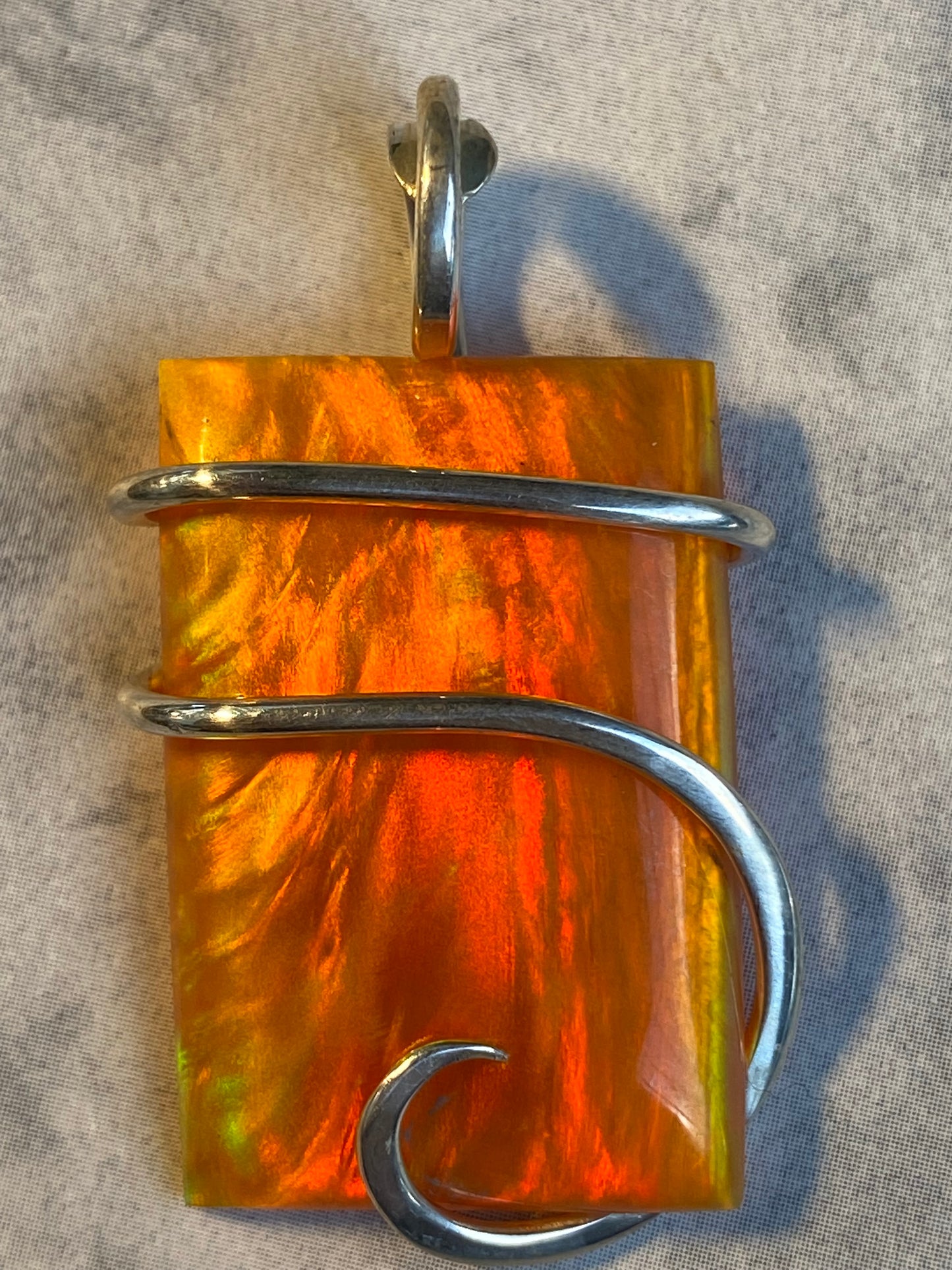 Aurora Borealis Opal in Sterling Silver Tension Wrapped Pendant