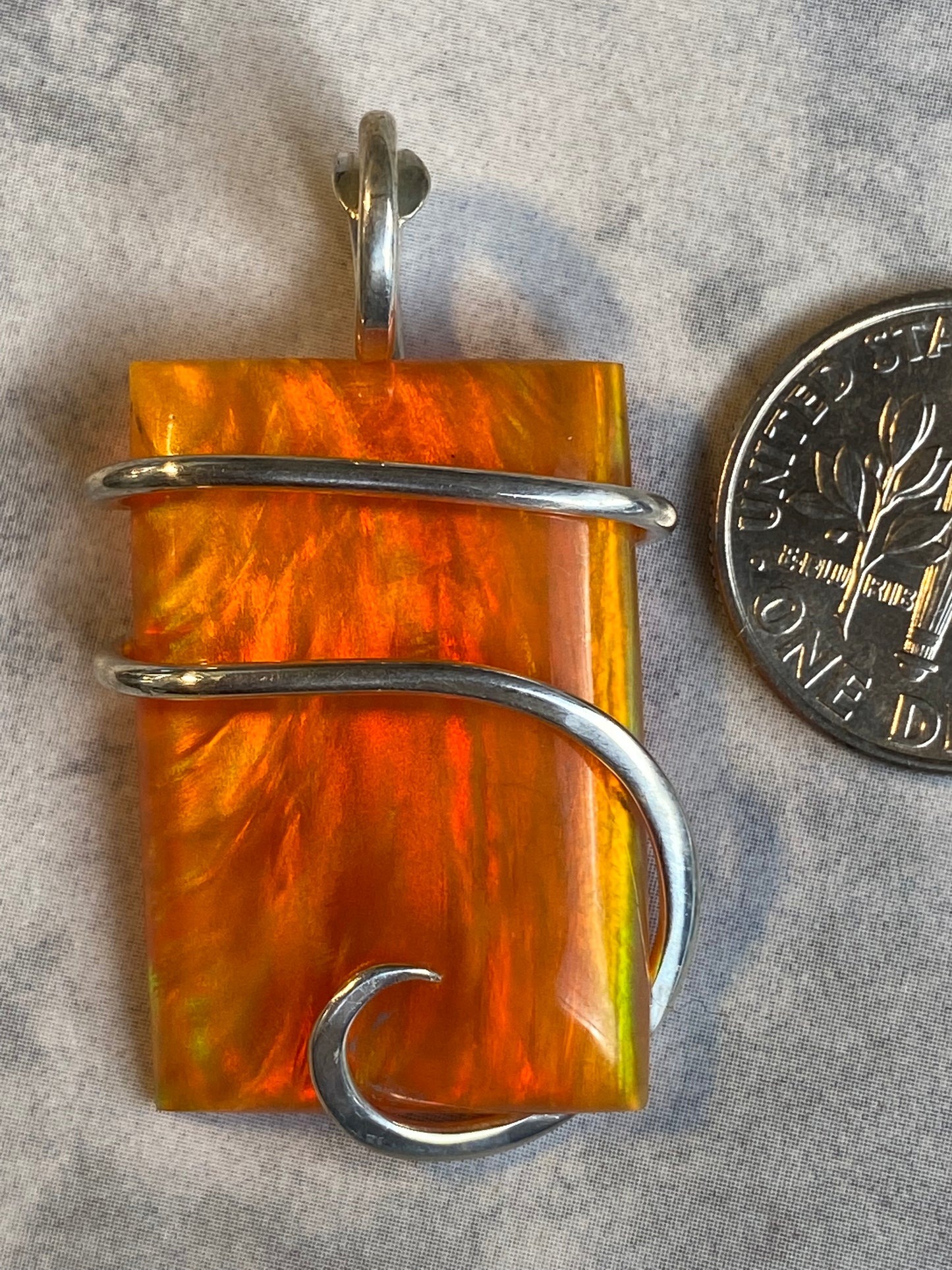 Aurora Borealis Opal in Sterling Silver Tension Wrapped Pendant