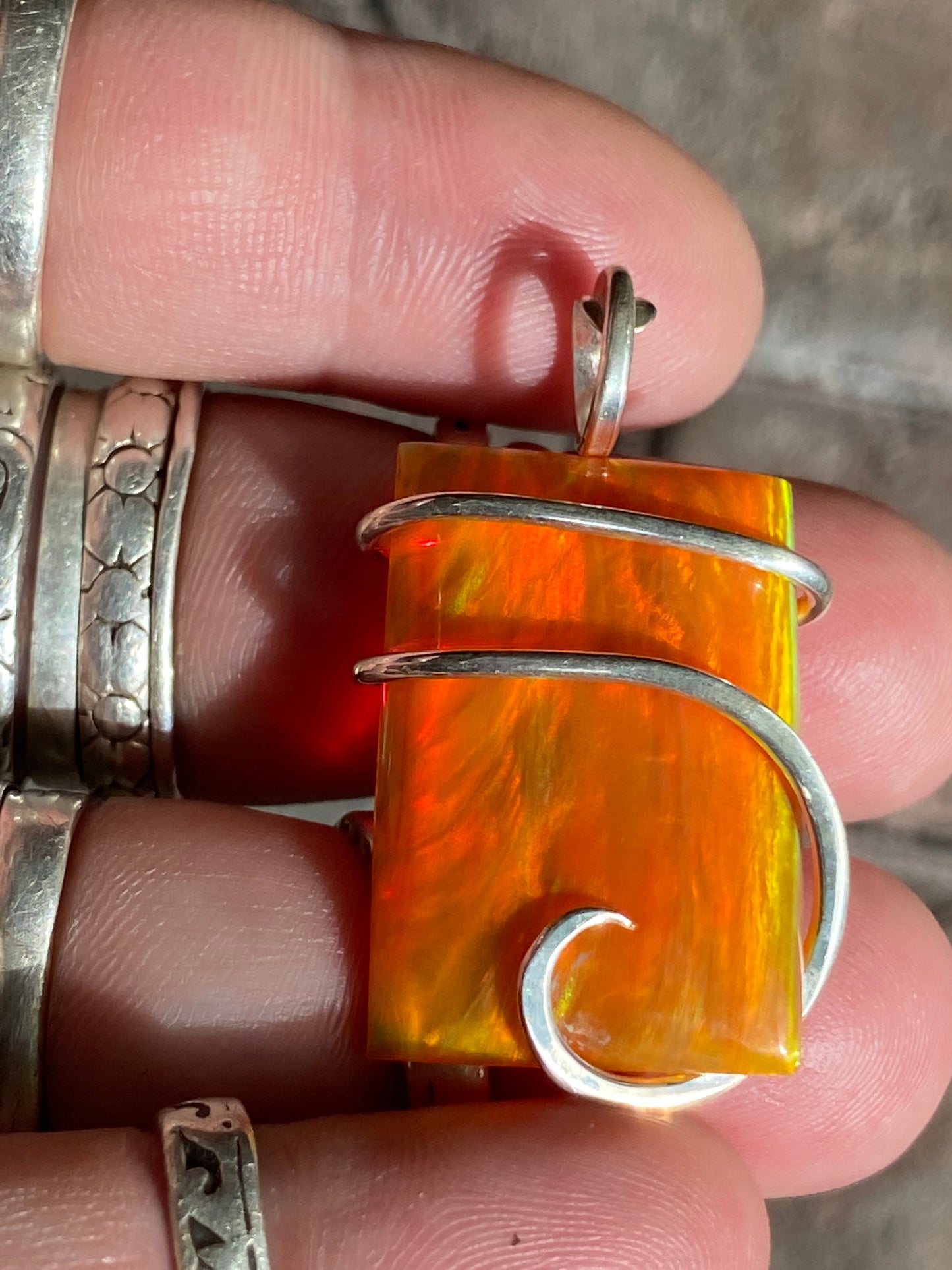 Aurora Borealis Opal in Sterling Silver Tension Wrapped Pendant