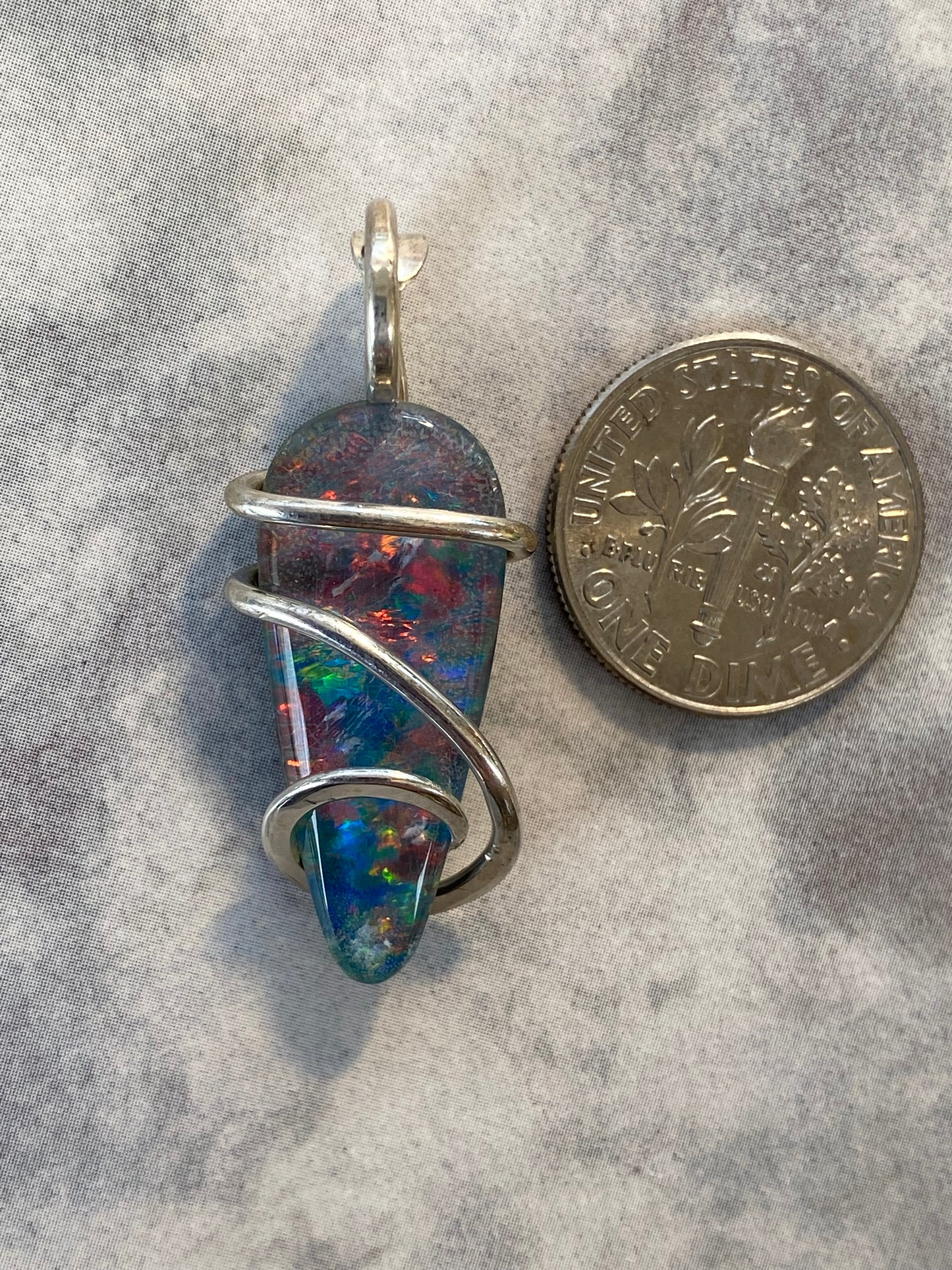 Opal Triplet in Sterling Silver Tension Wrapped Pendant