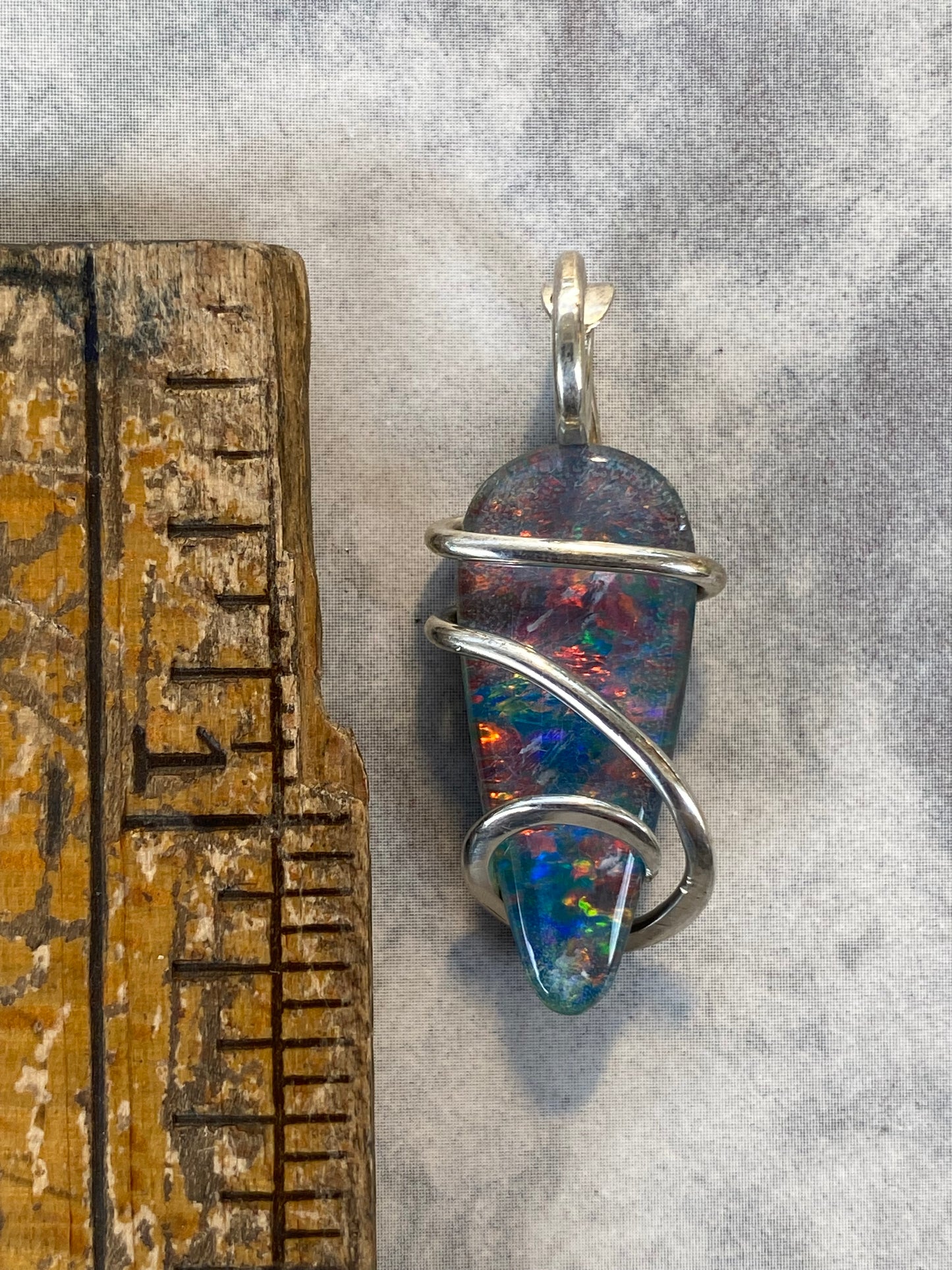 Opal Triplet in Sterling Silver Tension Wrapped Pendant