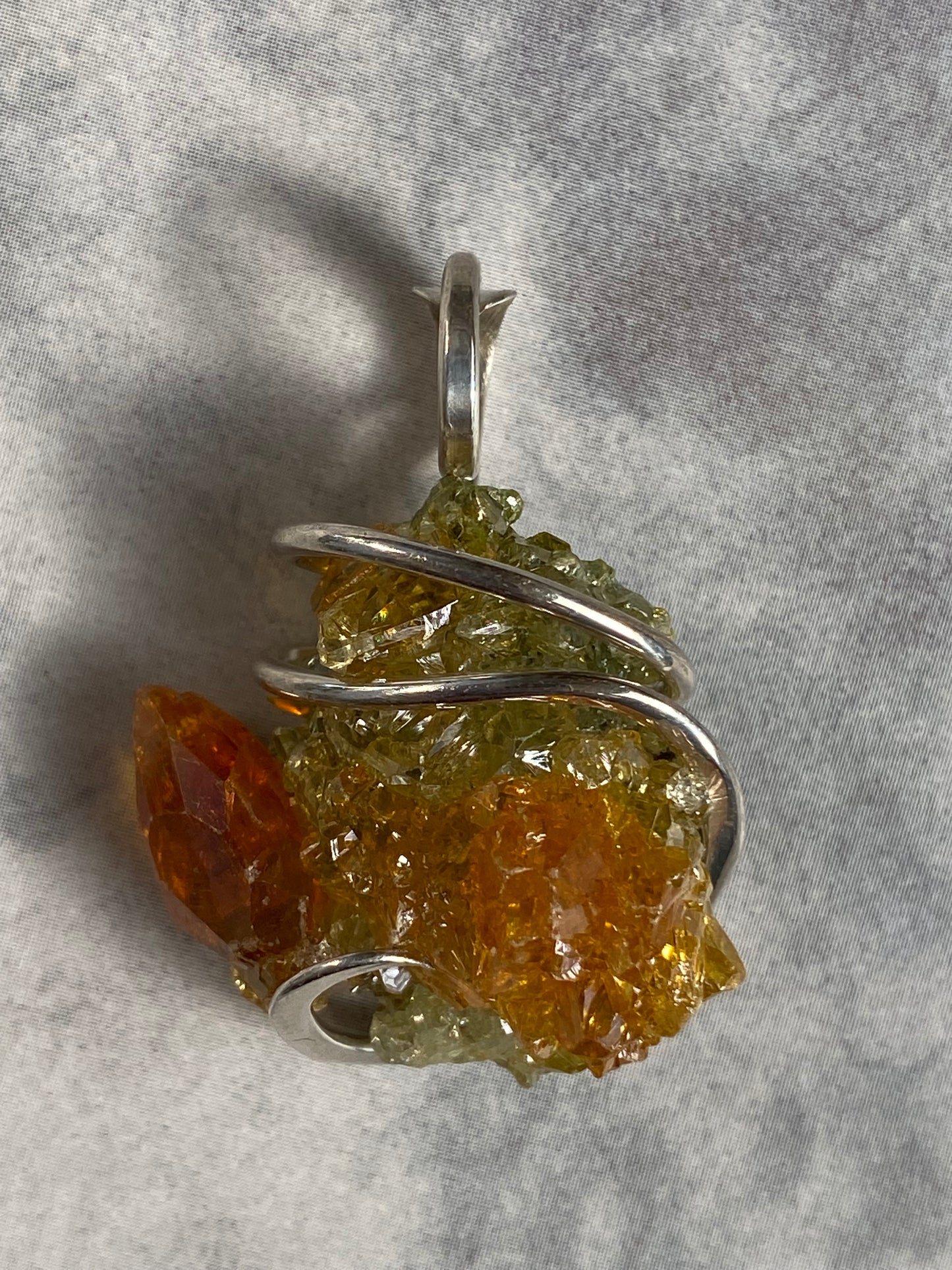 Polish Orange and Green Zincite in Sterling Silver Tension Wrapped Pendant