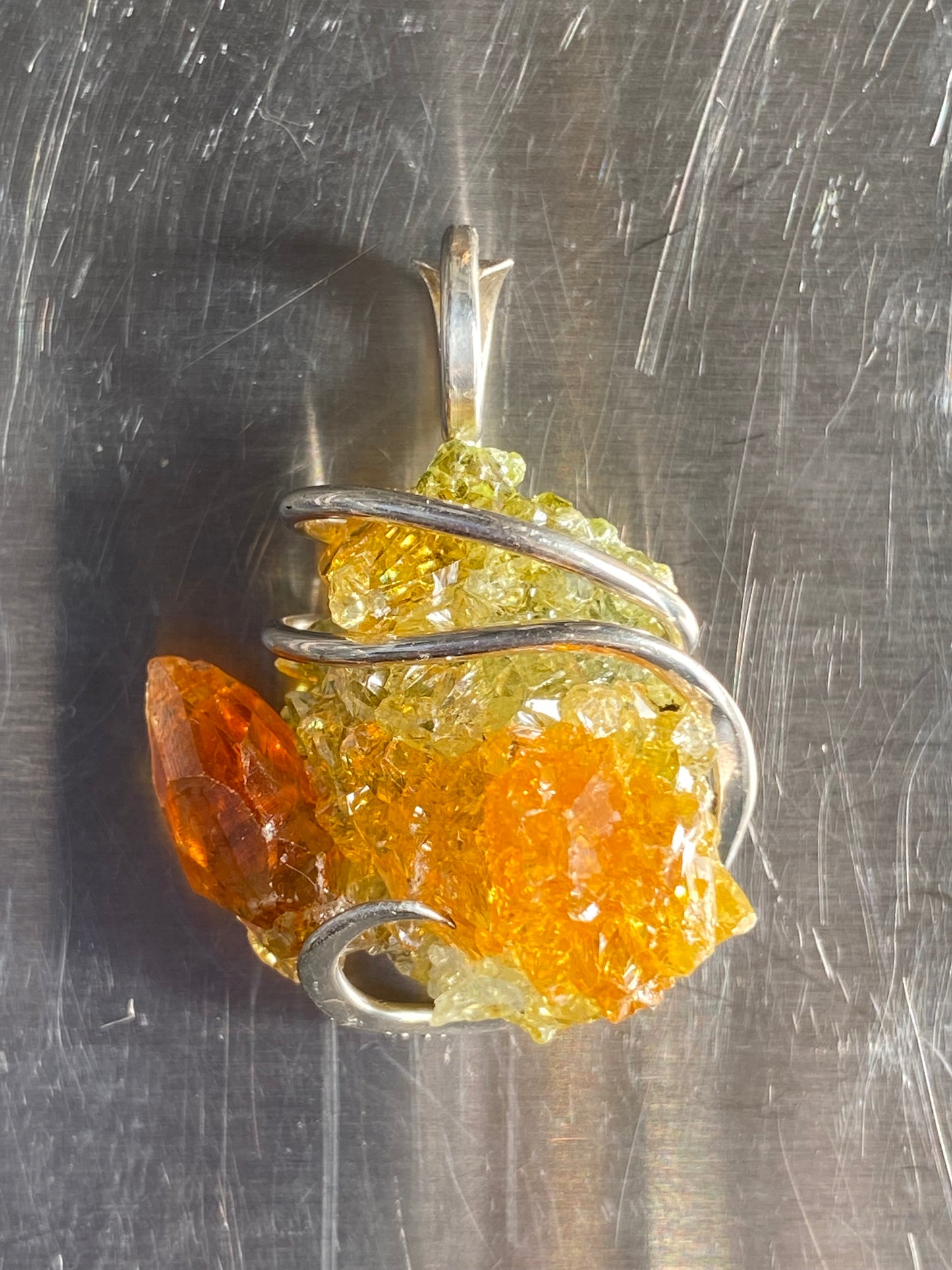Polish Orange and Green Zincite in Sterling Silver Tension Wrapped Pendant