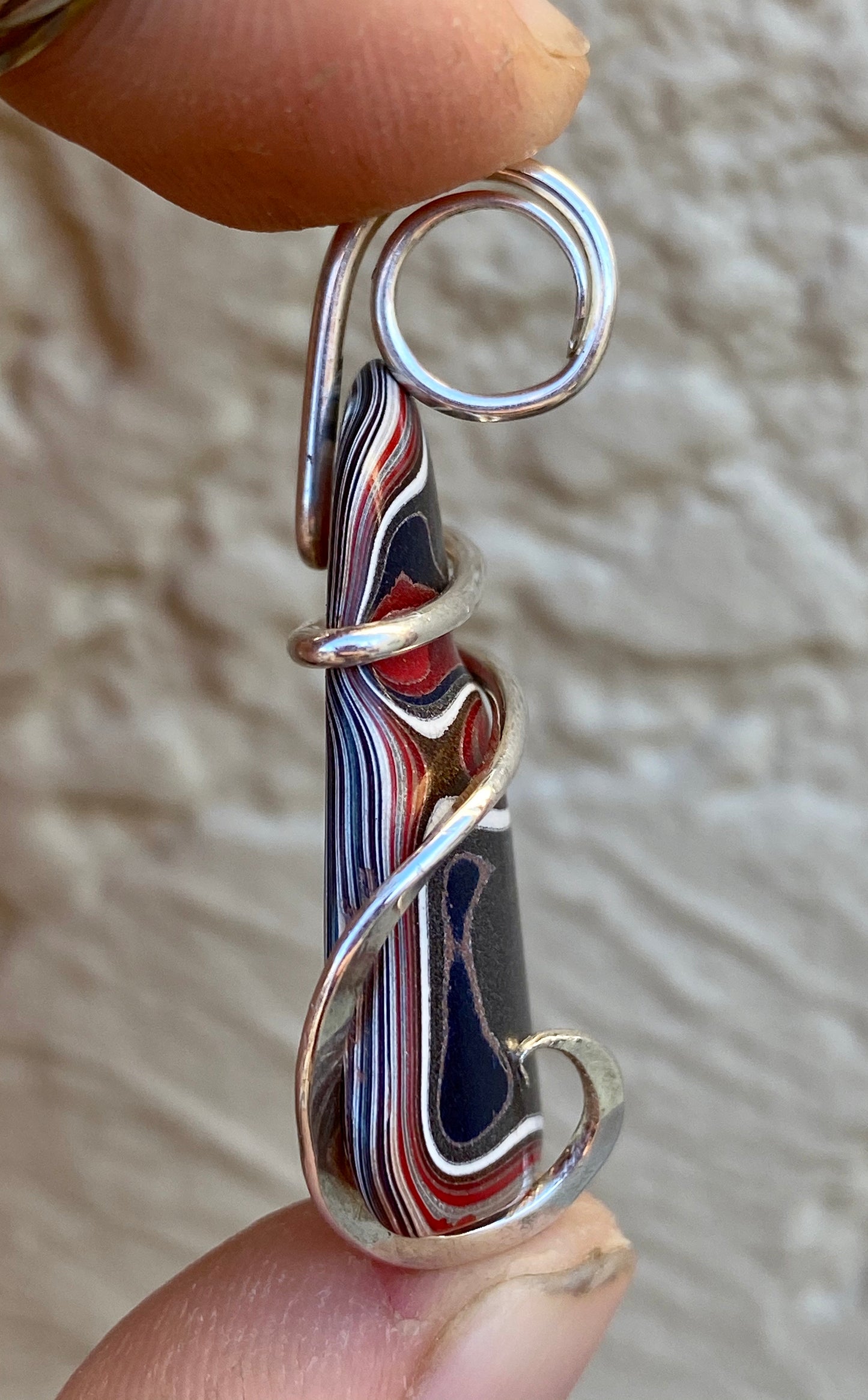 Fordite in Sterling Silver Tension Wrapped Pendant