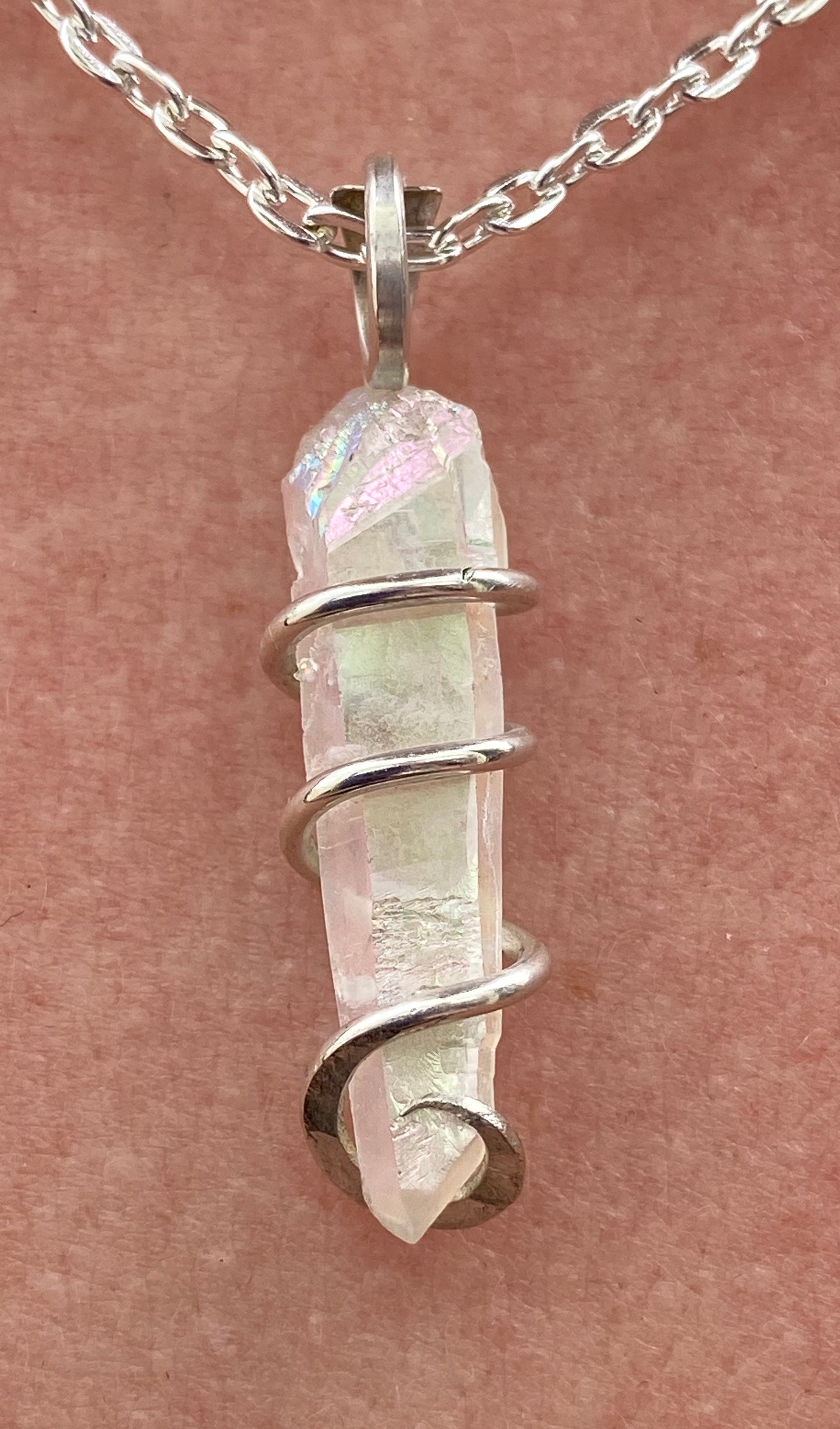 Platinum Infused Quartz Crystal in Sterling Silver Tension Wrapped Pendant