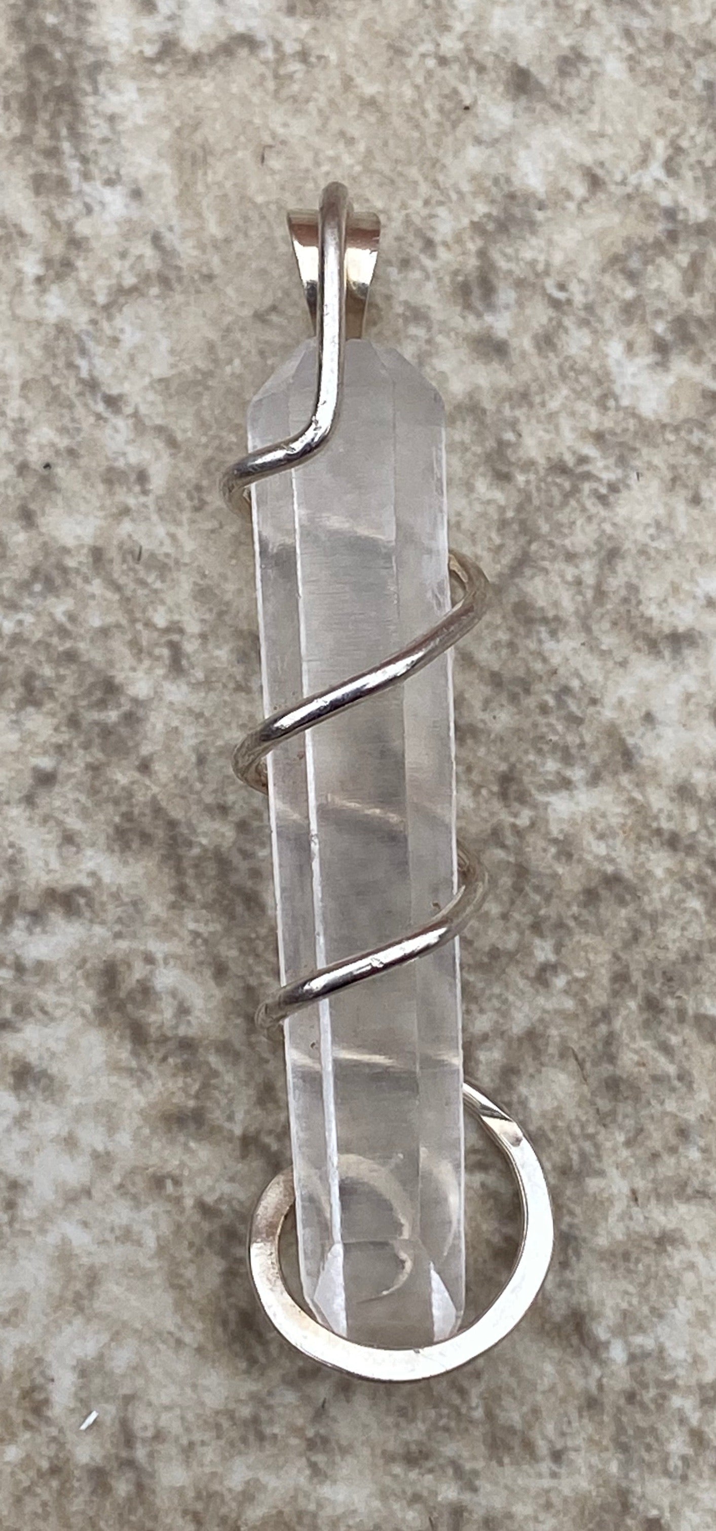Quartz Crystal in Sterling Silver Tension Wrapped Pendant