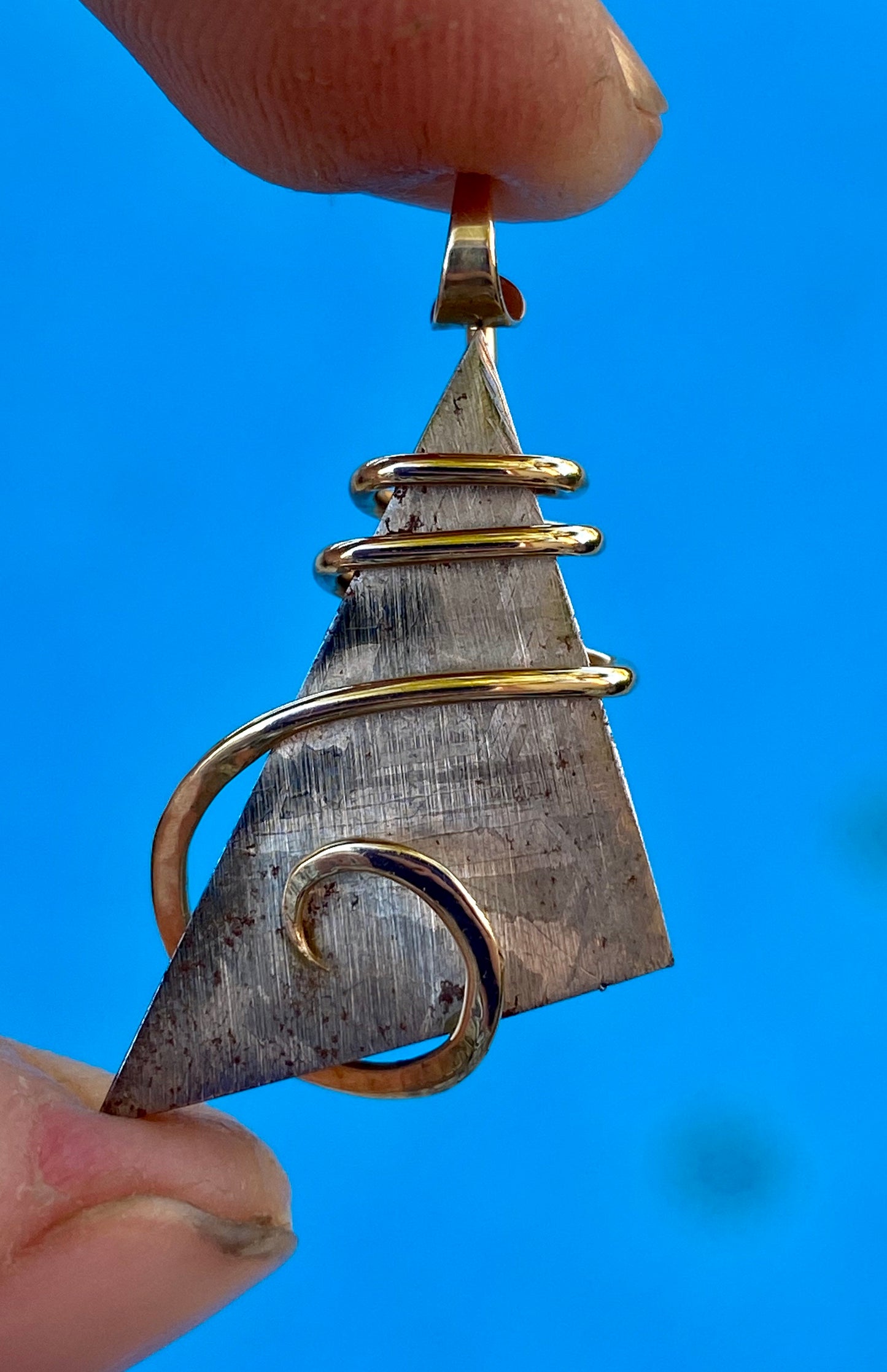 Sliced Meteorite in 14kt Gold Tension Wrapped Pendant