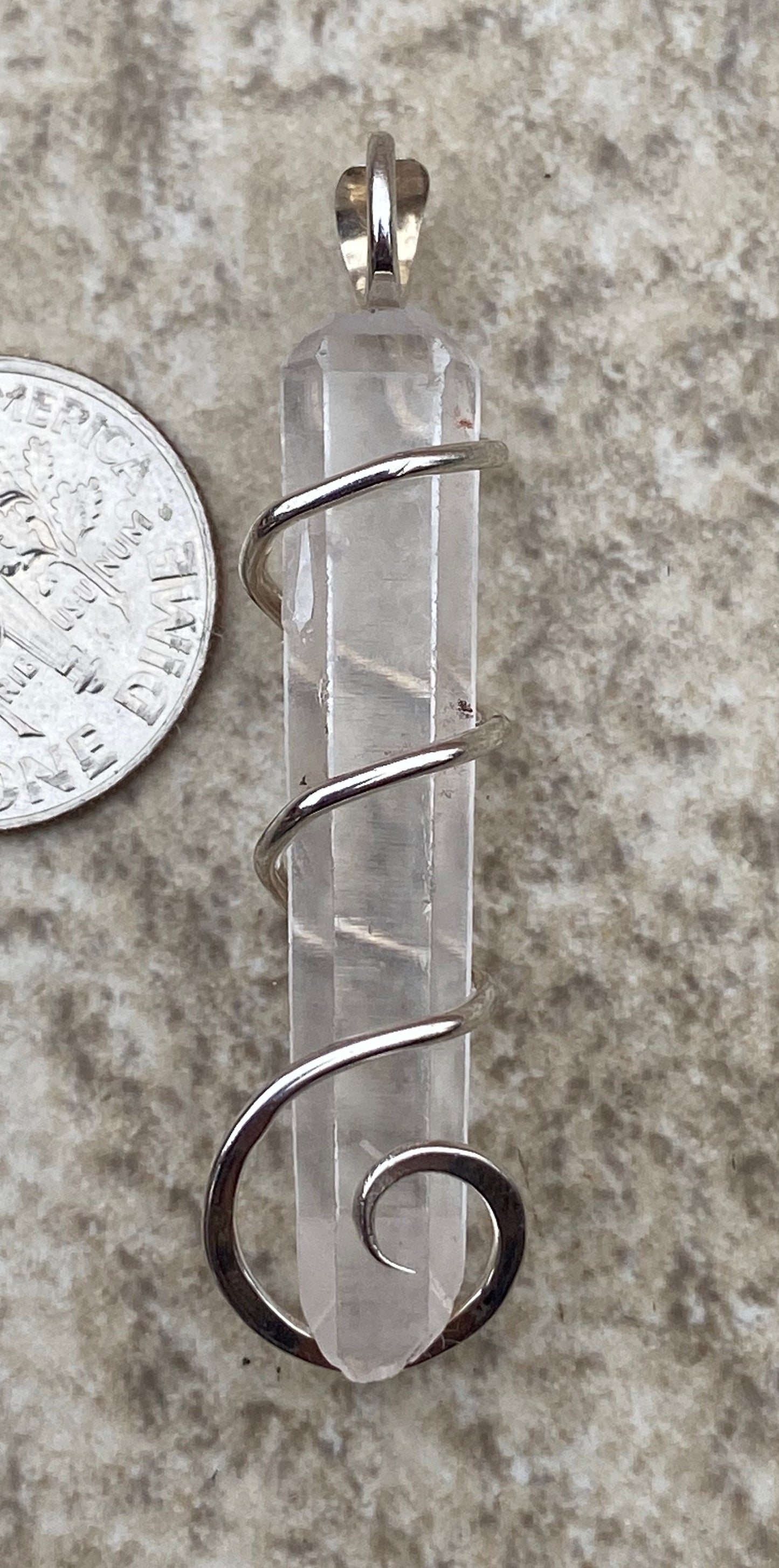 Quartz Crystal in Sterling Silver Tension Wrapped Pendant