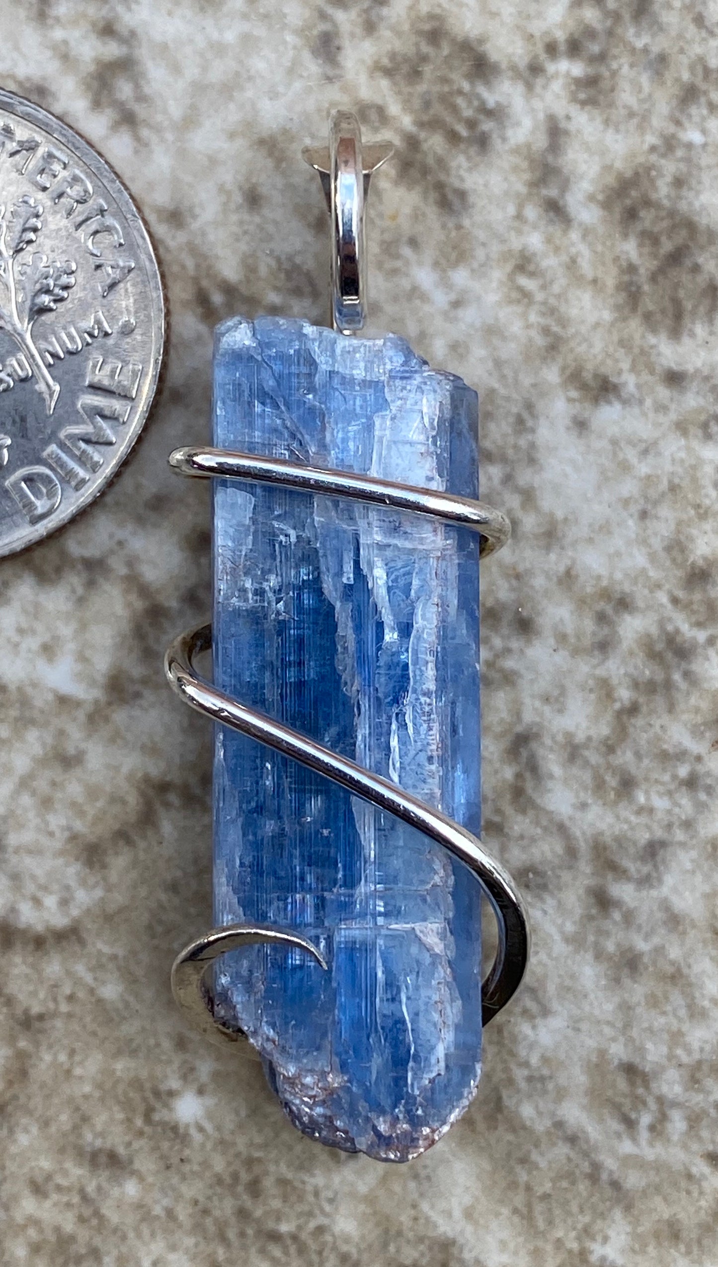 Blue Kyanite Crystal in Sterling Silver Tension Wrapped Pendant