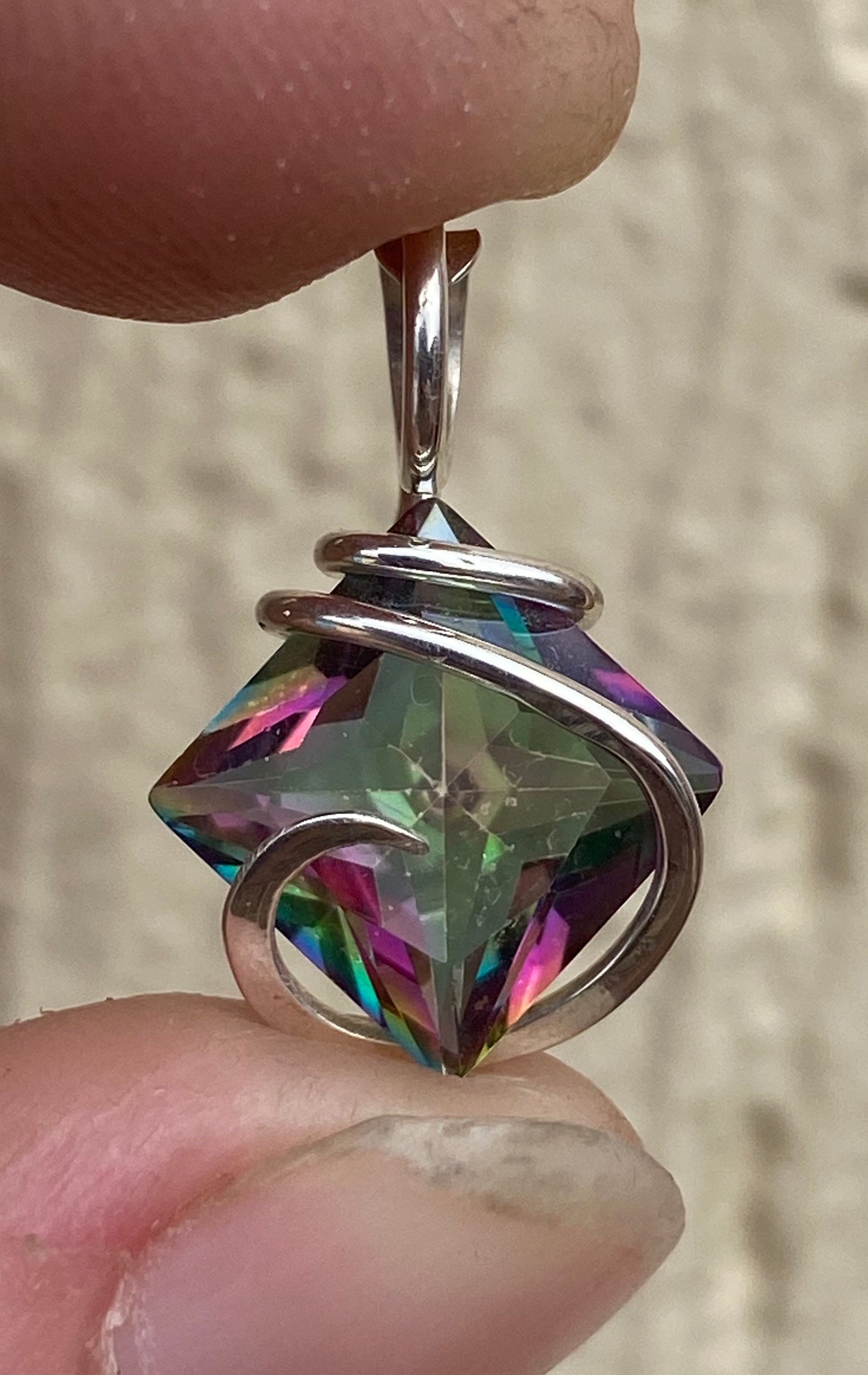 Titanium Infused Faceted Topaz in Sterling Silver Tension Wrapped Pendant