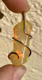 Ethiopian Opal in 14kt Gold Tension Wrapped Pendant