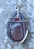 Fordite in Sterling Silver Tension Wrapped Pendant