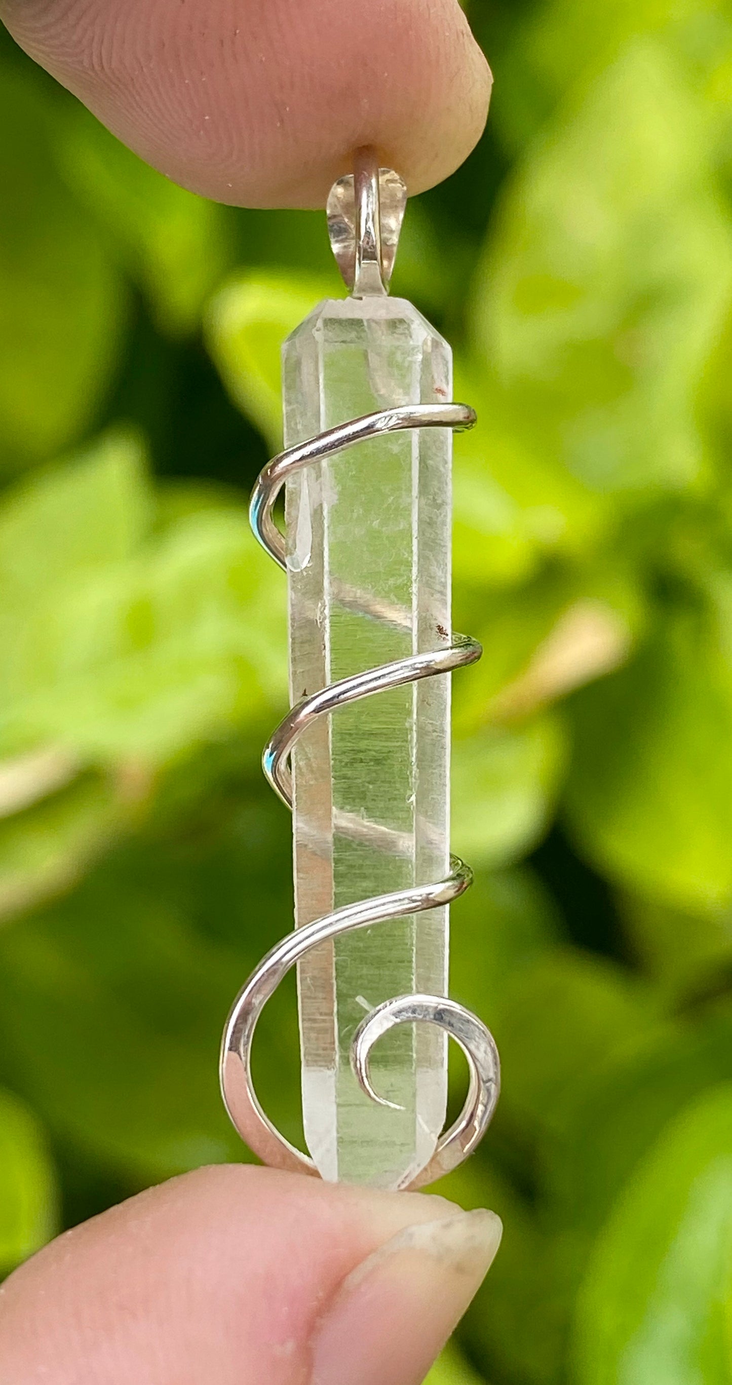 Quartz Crystal in Sterling Silver Tension Wrapped Pendant