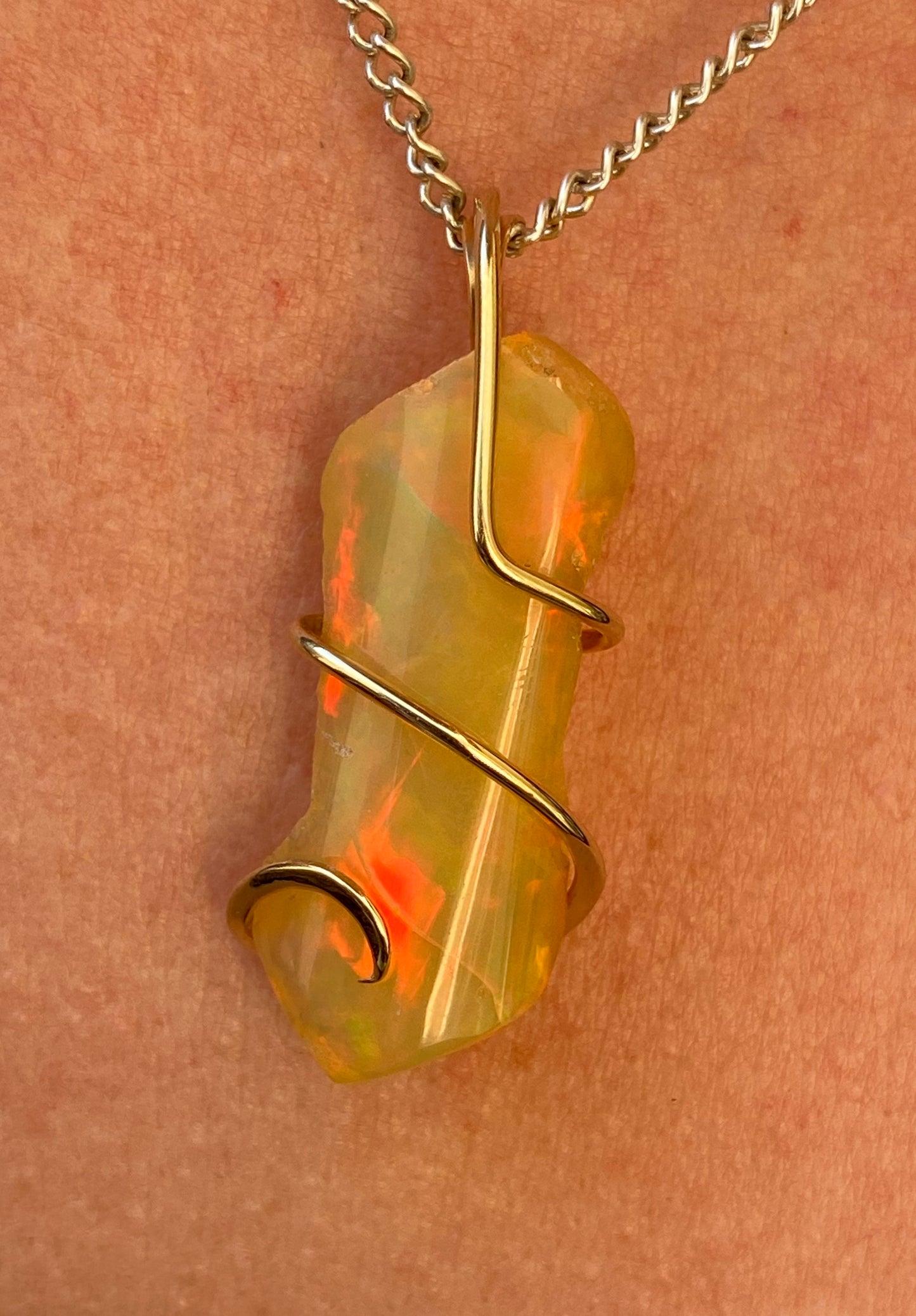 Ethiopian Opal in 14kt Gold Tension Wrapped Pendant