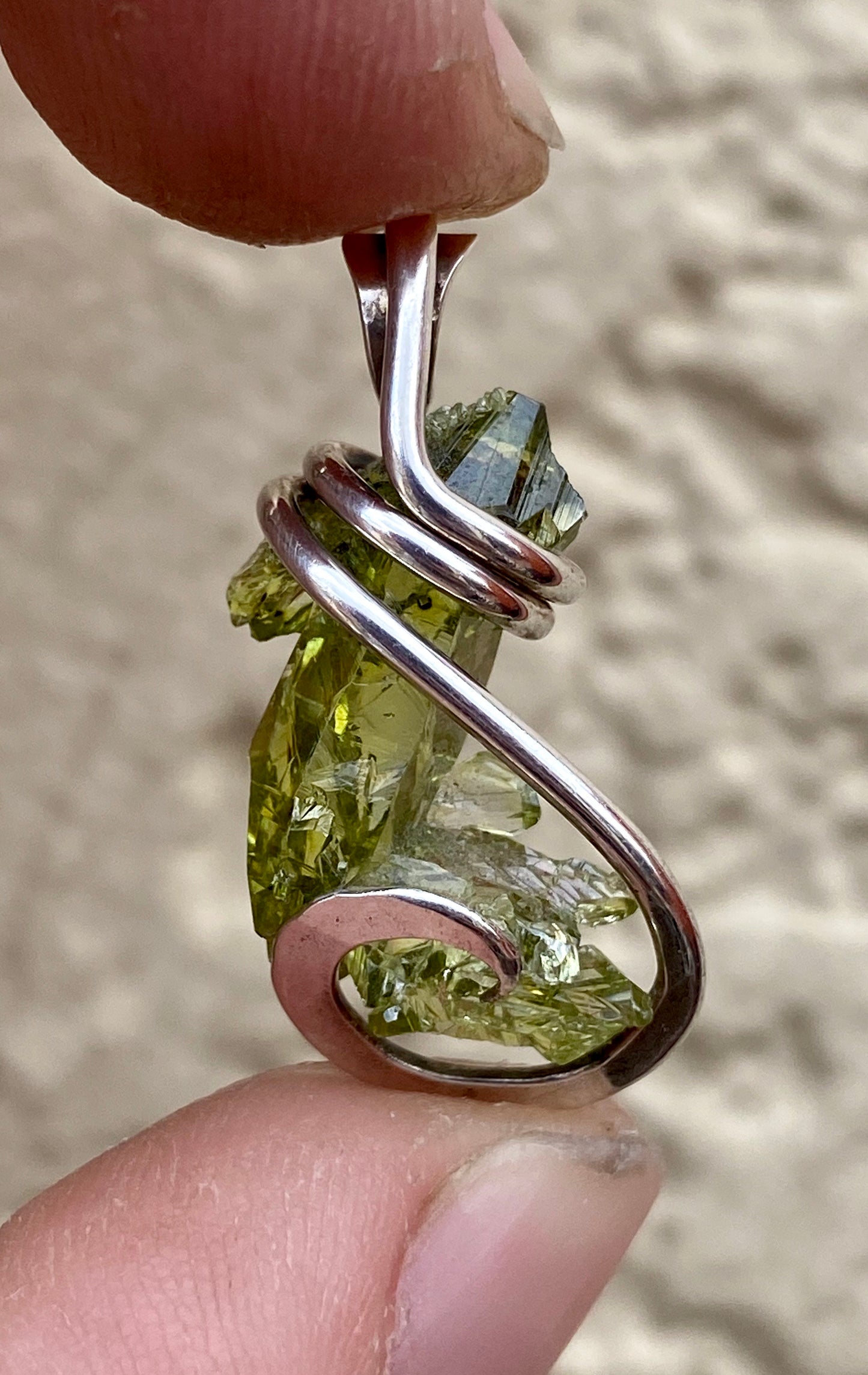 Polish Green Zincite in Sterling Silver Tension Wrapped Pendant