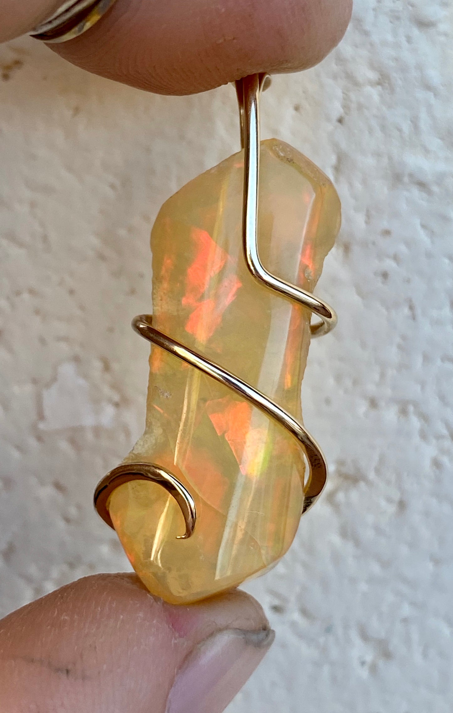 Ethiopian Opal in 14kt Gold Tension Wrapped Pendant