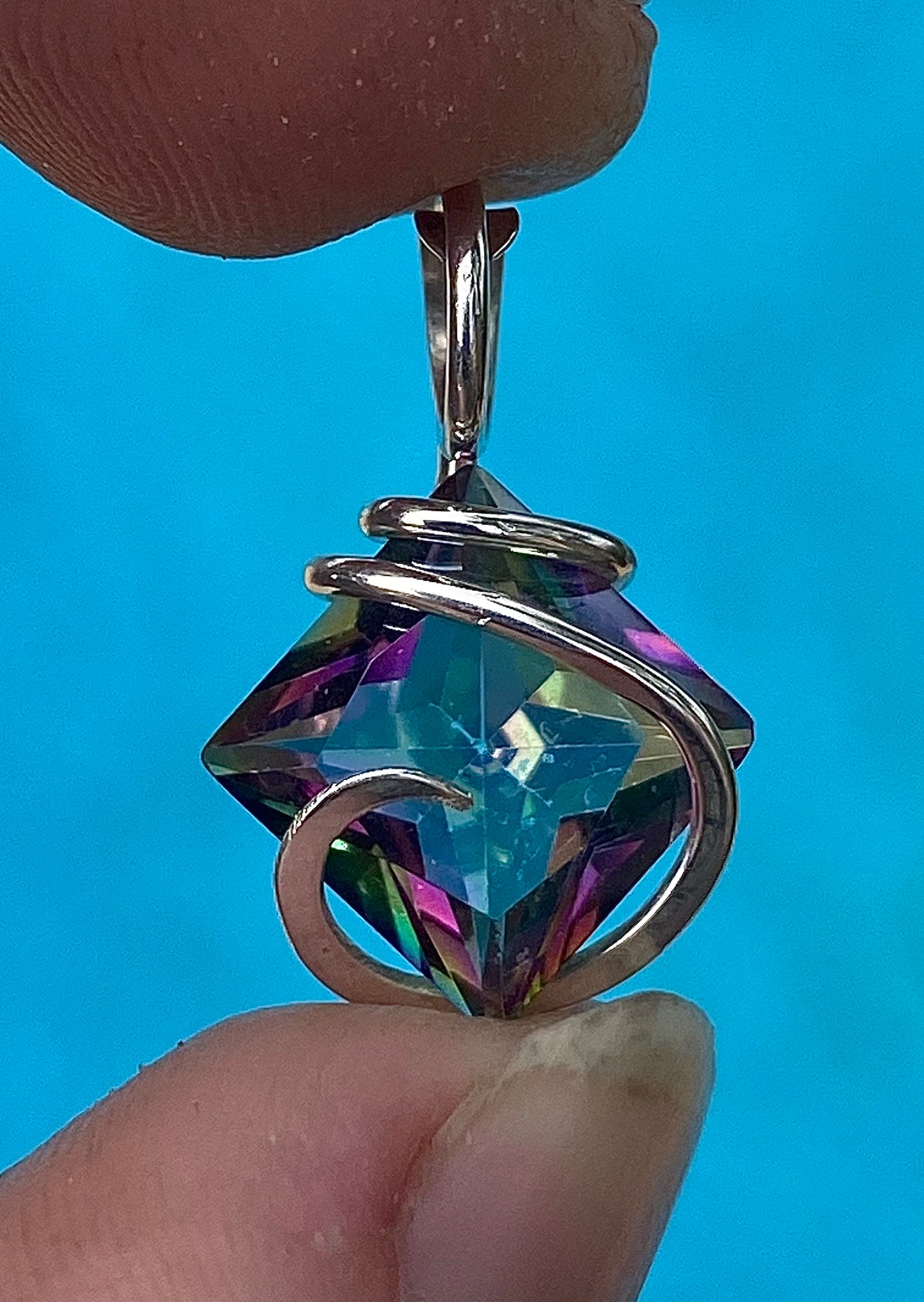 Titanium Infused Faceted Topaz in Sterling Silver Tension Wrapped Pendant