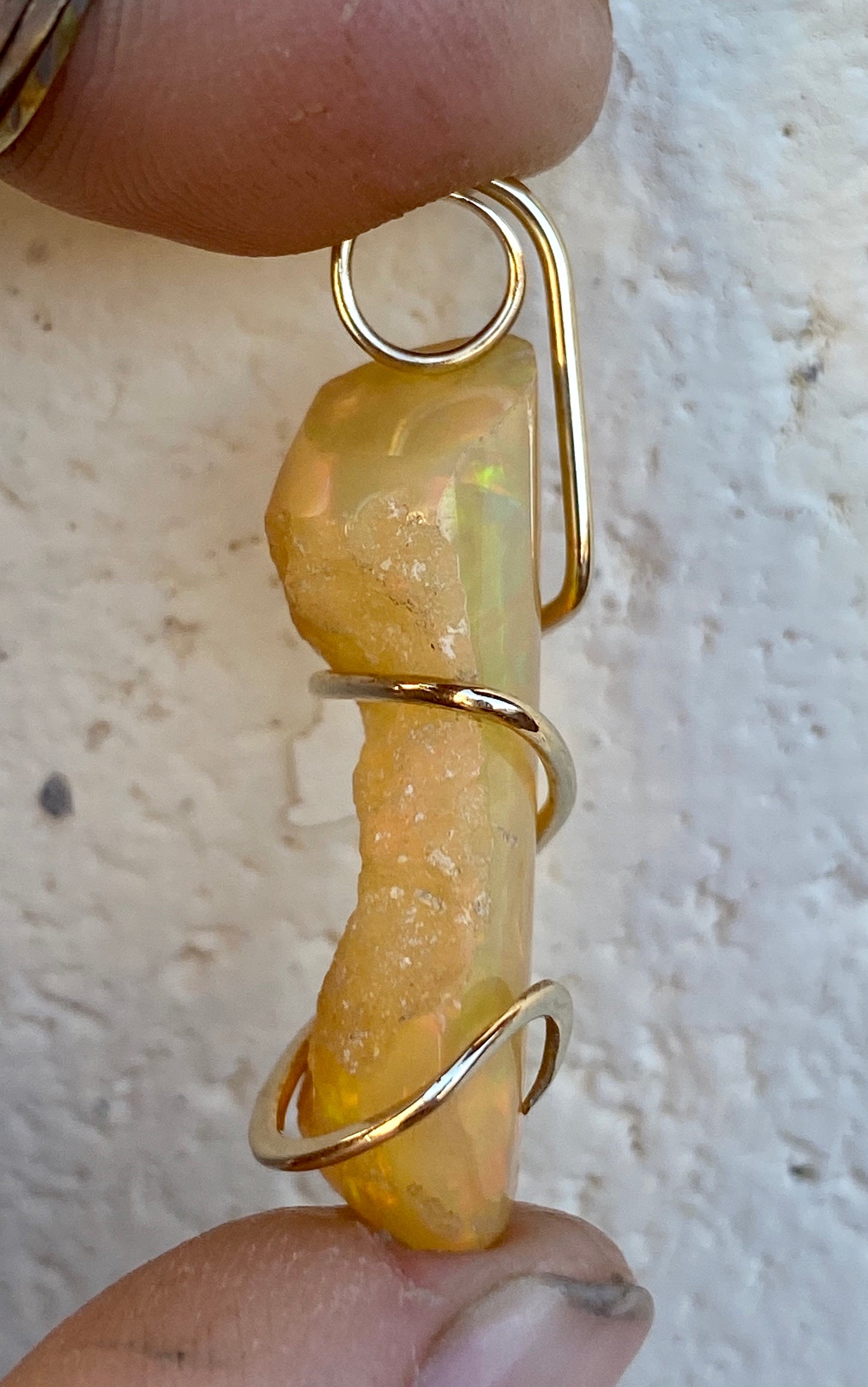 Ethiopian Opal in 14kt Gold Tension Wrapped Pendant