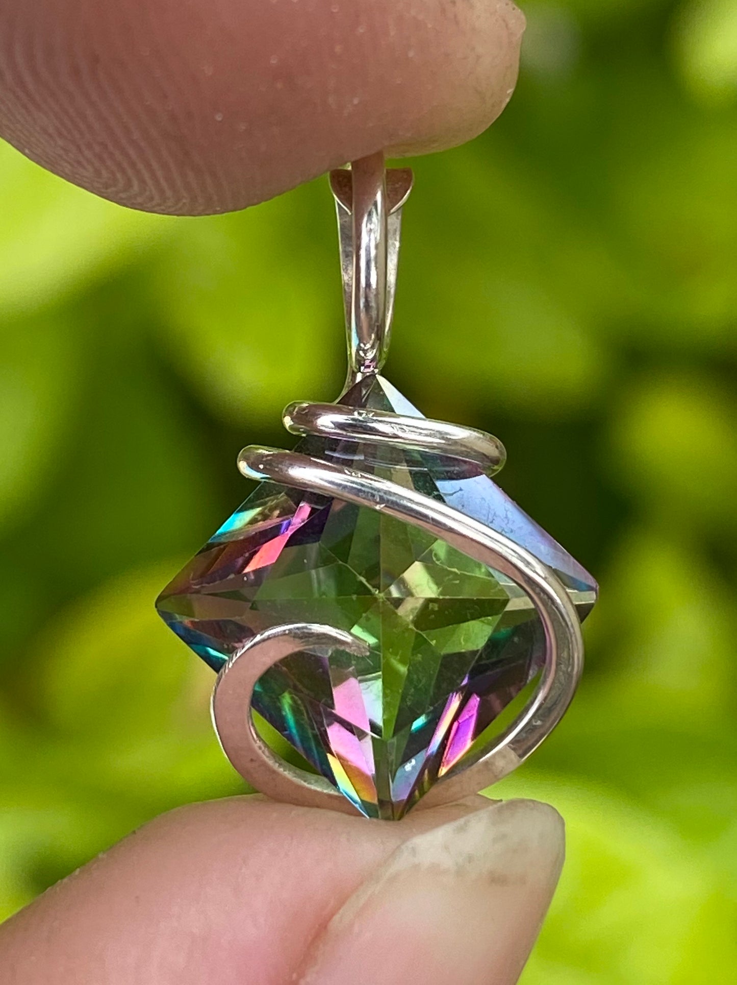 Titanium Infused Faceted Topaz in Sterling Silver Tension Wrapped Pendant
