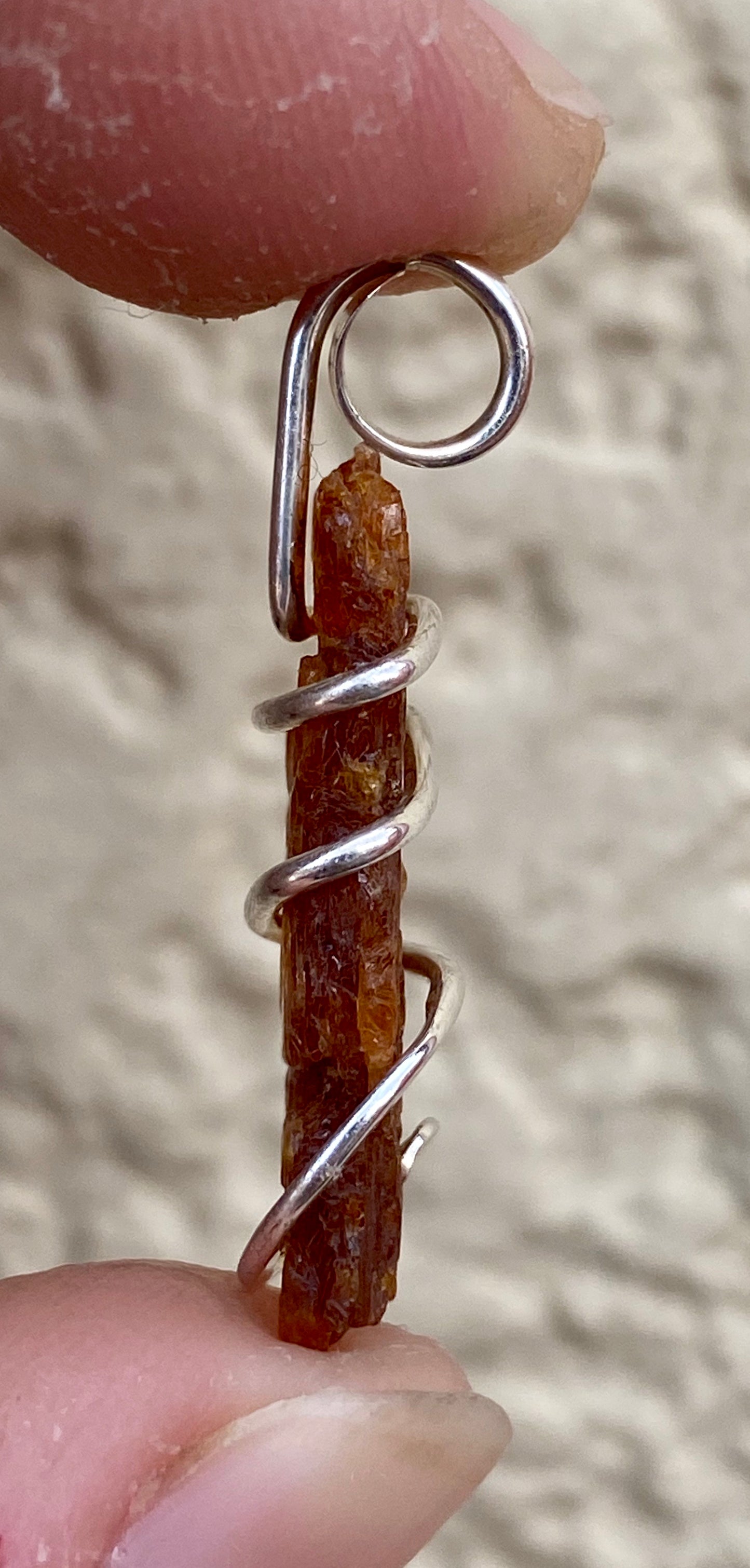 Red Kyanite Crystal in Sterling Silver Tension Wrapped Pendant