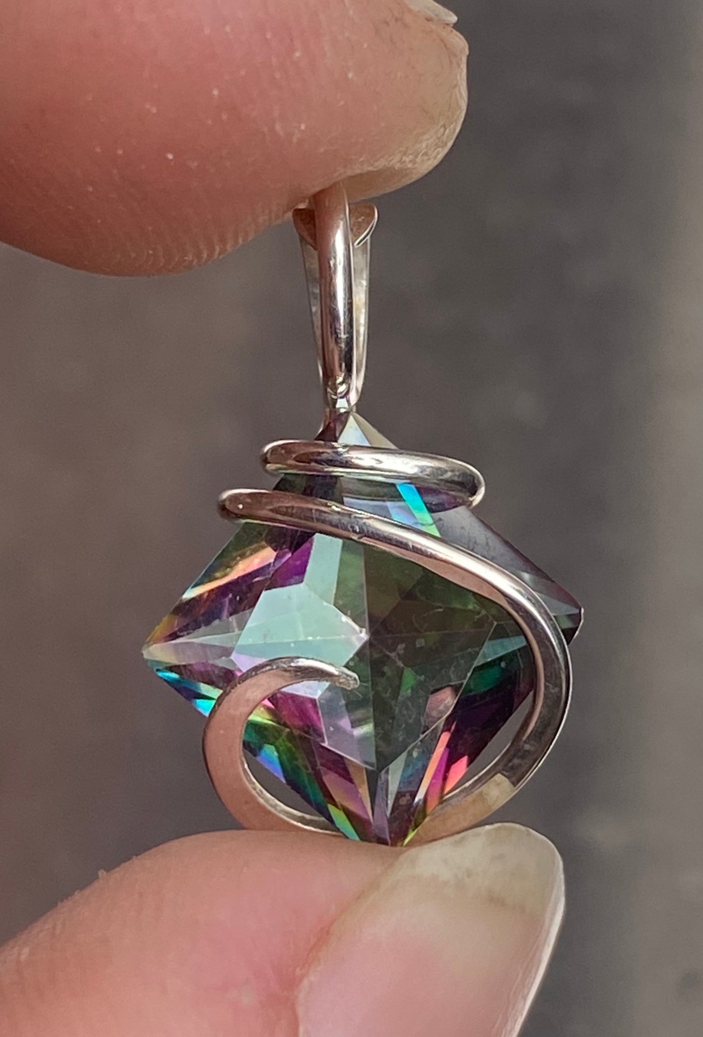 Titanium Infused Faceted Topaz in Sterling Silver Tension Wrapped Pendant