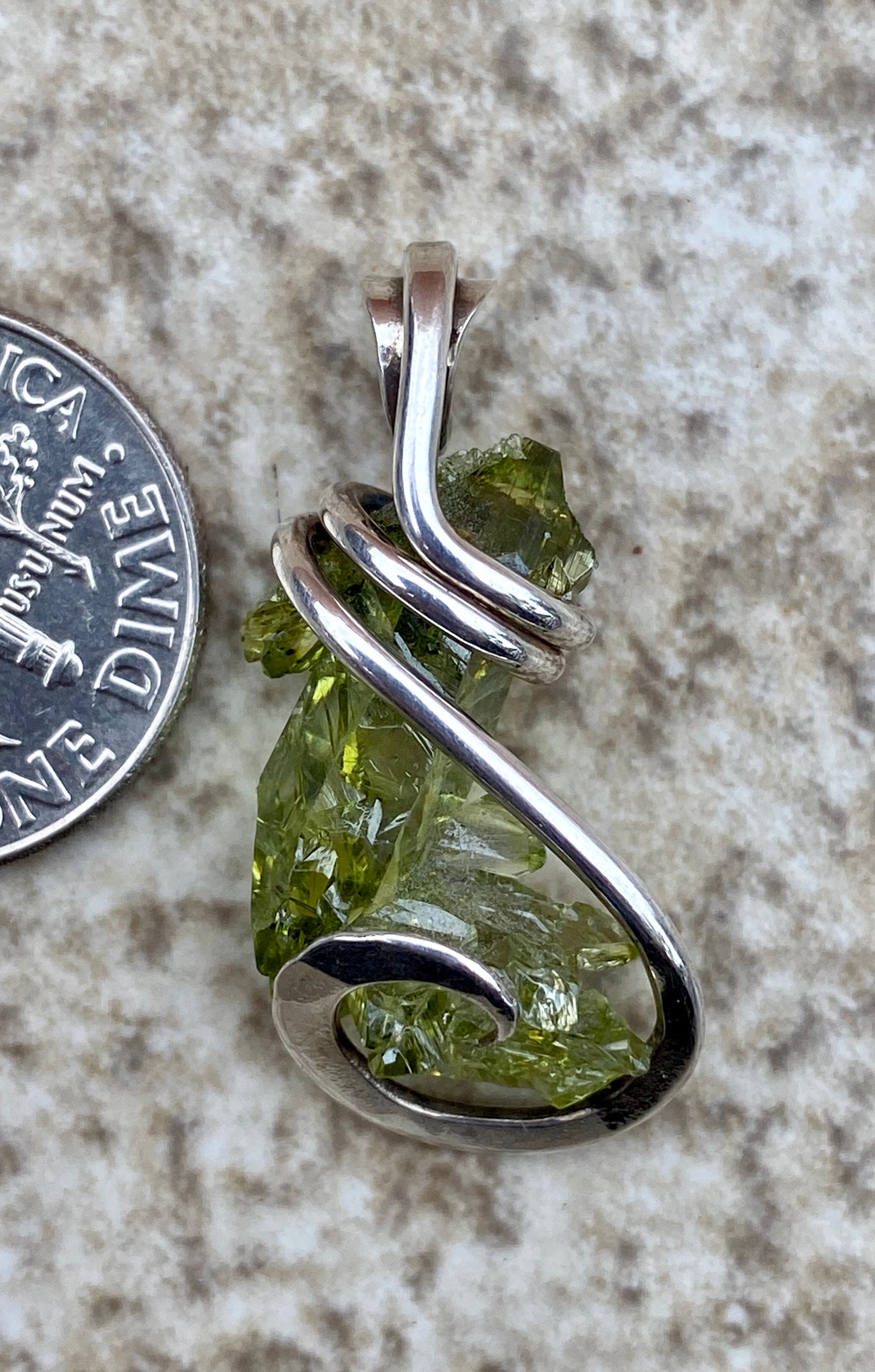 Polish Green Zincite in Sterling Silver Tension Wrapped Pendant