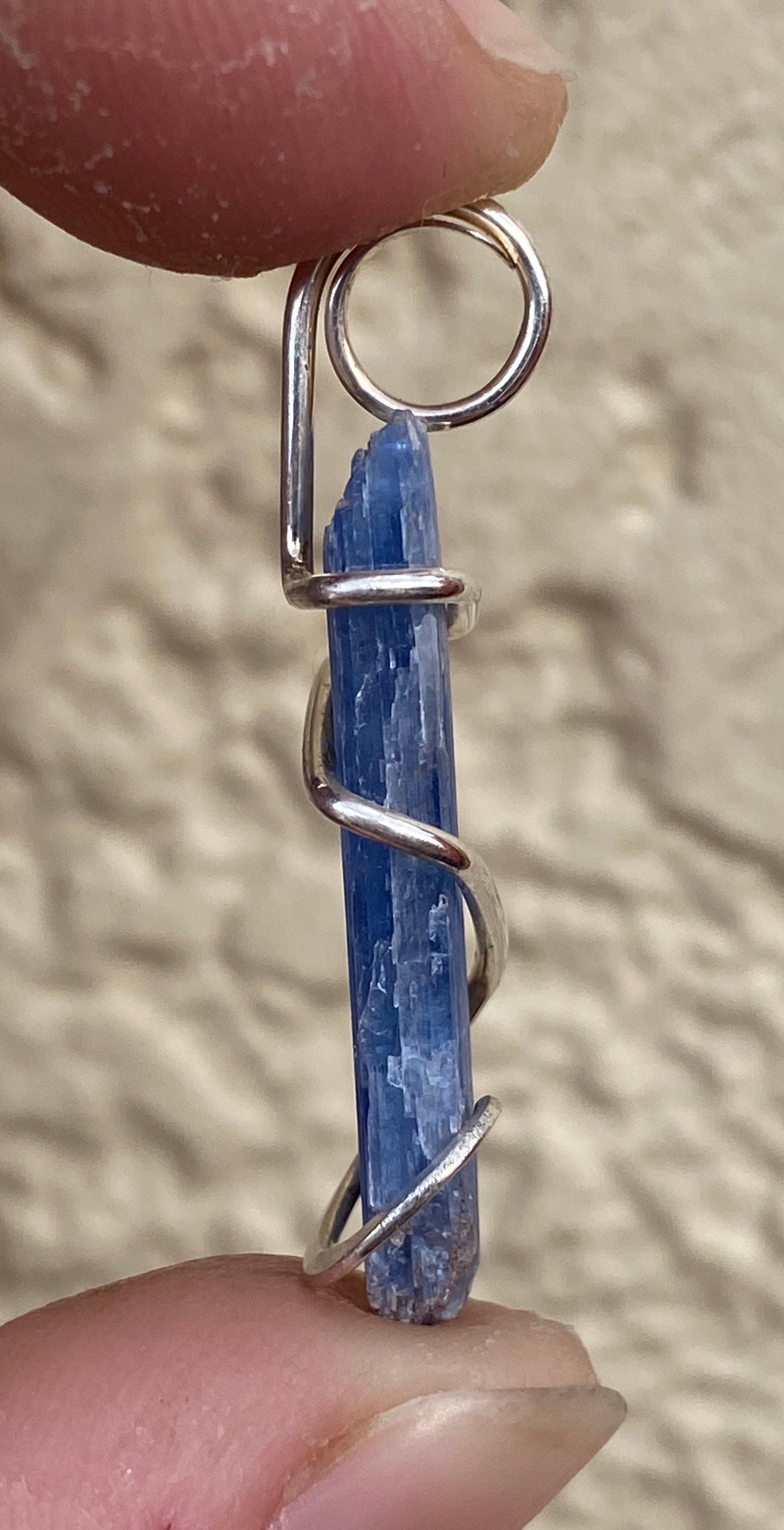 Blue Kyanite Crystal in Sterling Silver Tension Wrapped Pendant