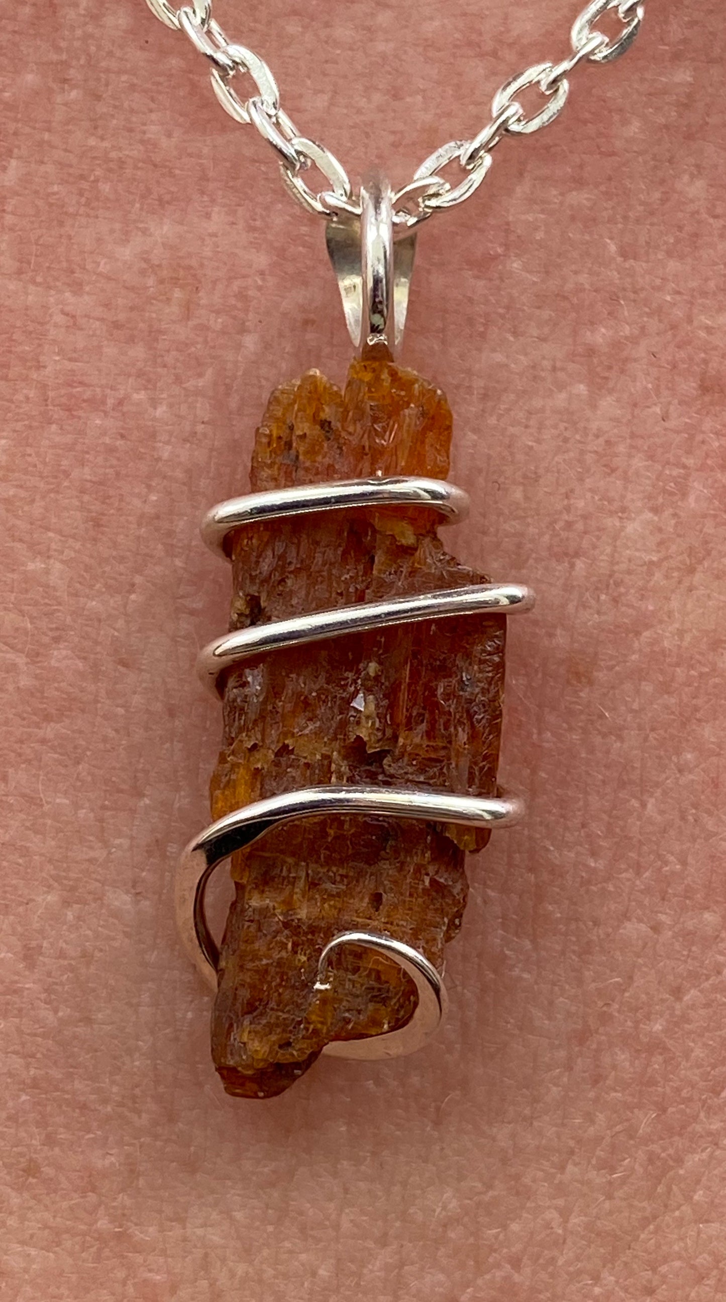 Red Kyanite Crystal in Sterling Silver Tension Wrapped Pendant