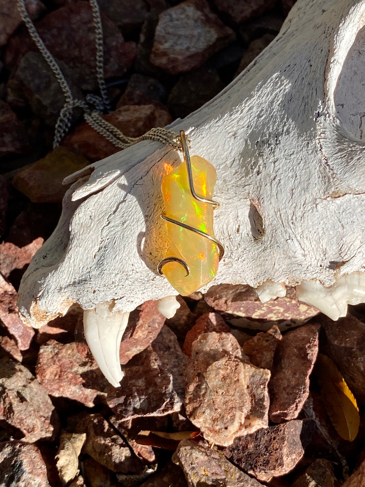 Ethiopian Opal in 14kt Gold Tension Wrapped Pendant