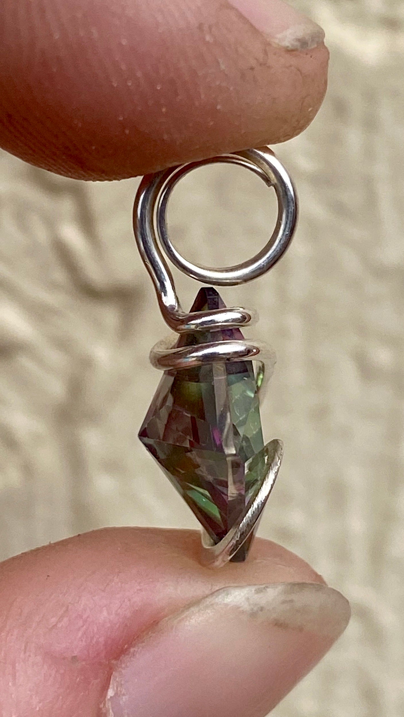 Titanium Infused Faceted Topaz in Sterling Silver Tension Wrapped Pendant