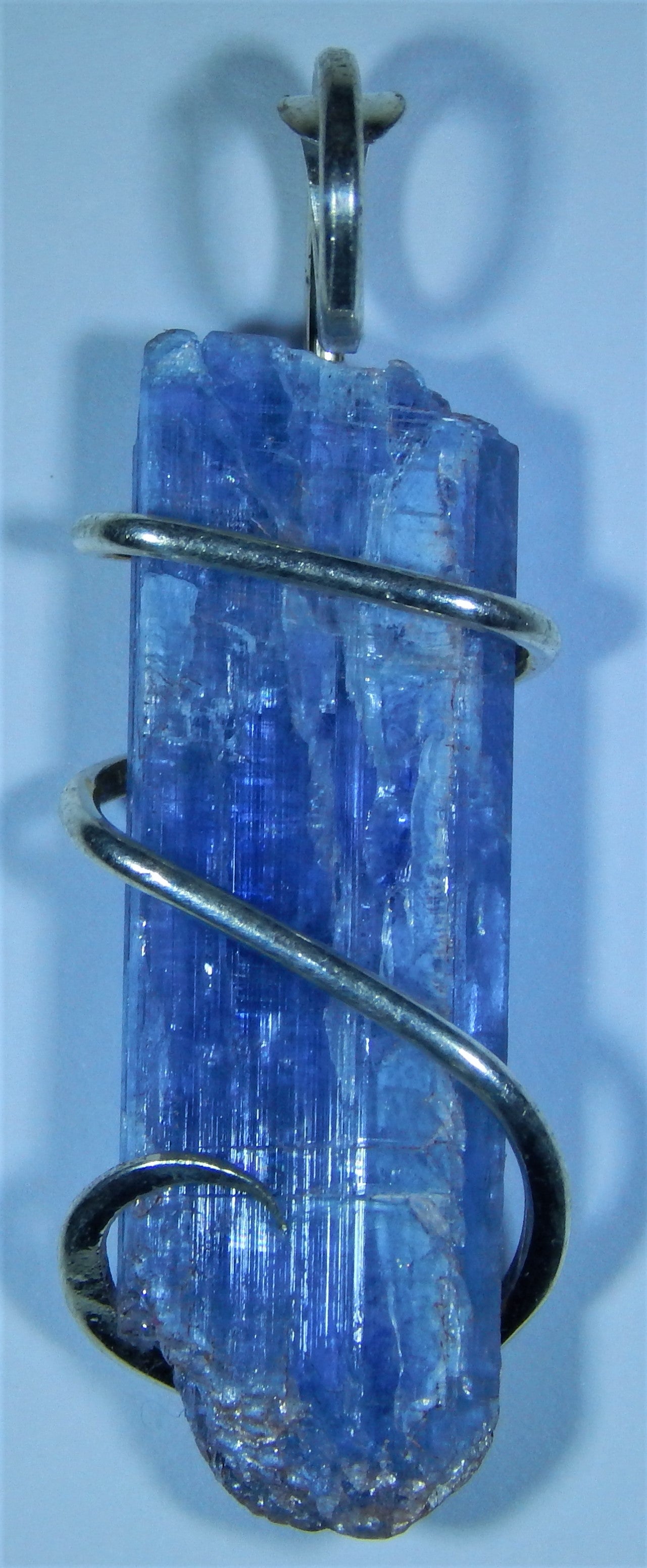 Blue Kyanite Crystal in Sterling Silver Tension Wrapped Pendant