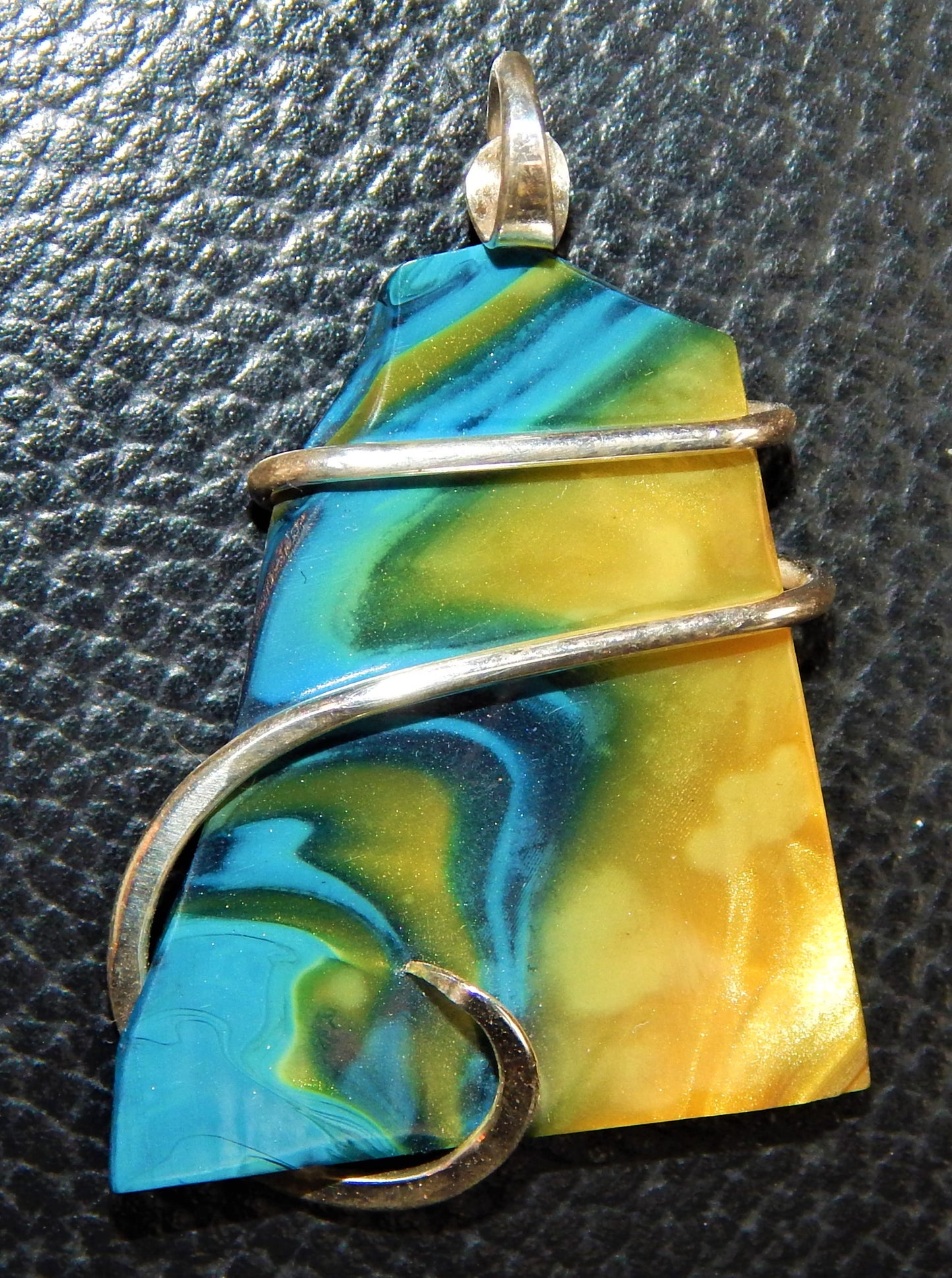 Bowlerite Shard in Sterling Silver Tension Wrapped Pendant