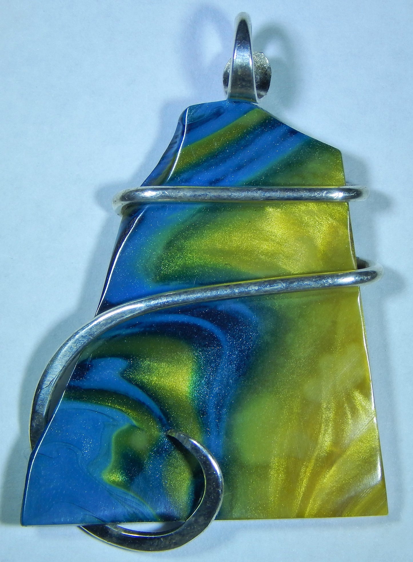 Bowlerite Shard in Sterling Silver Tension Wrapped Pendant