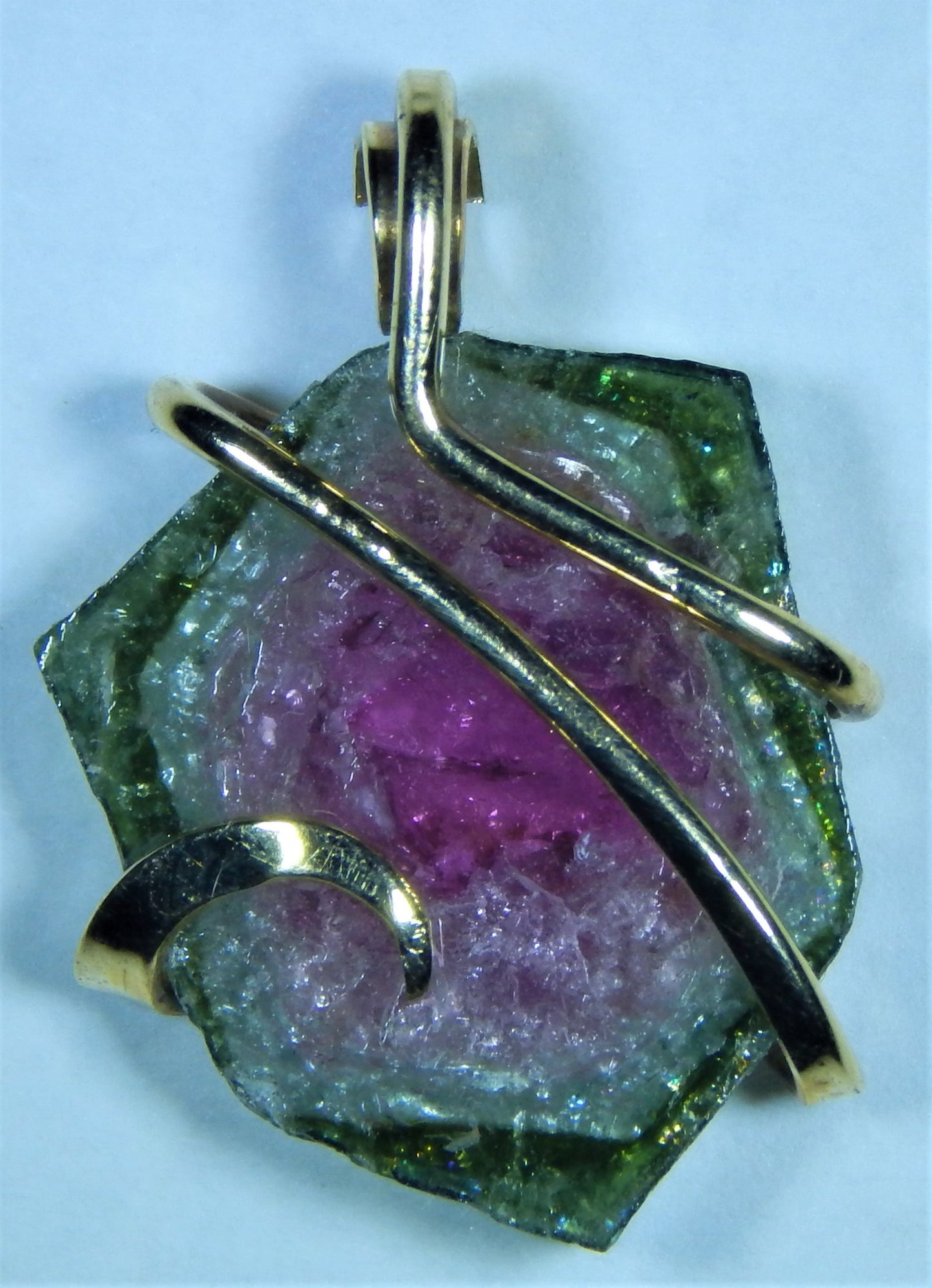 Watermelon Tourmaline Slice in 14kt Gold Tension Wrapped Pendant