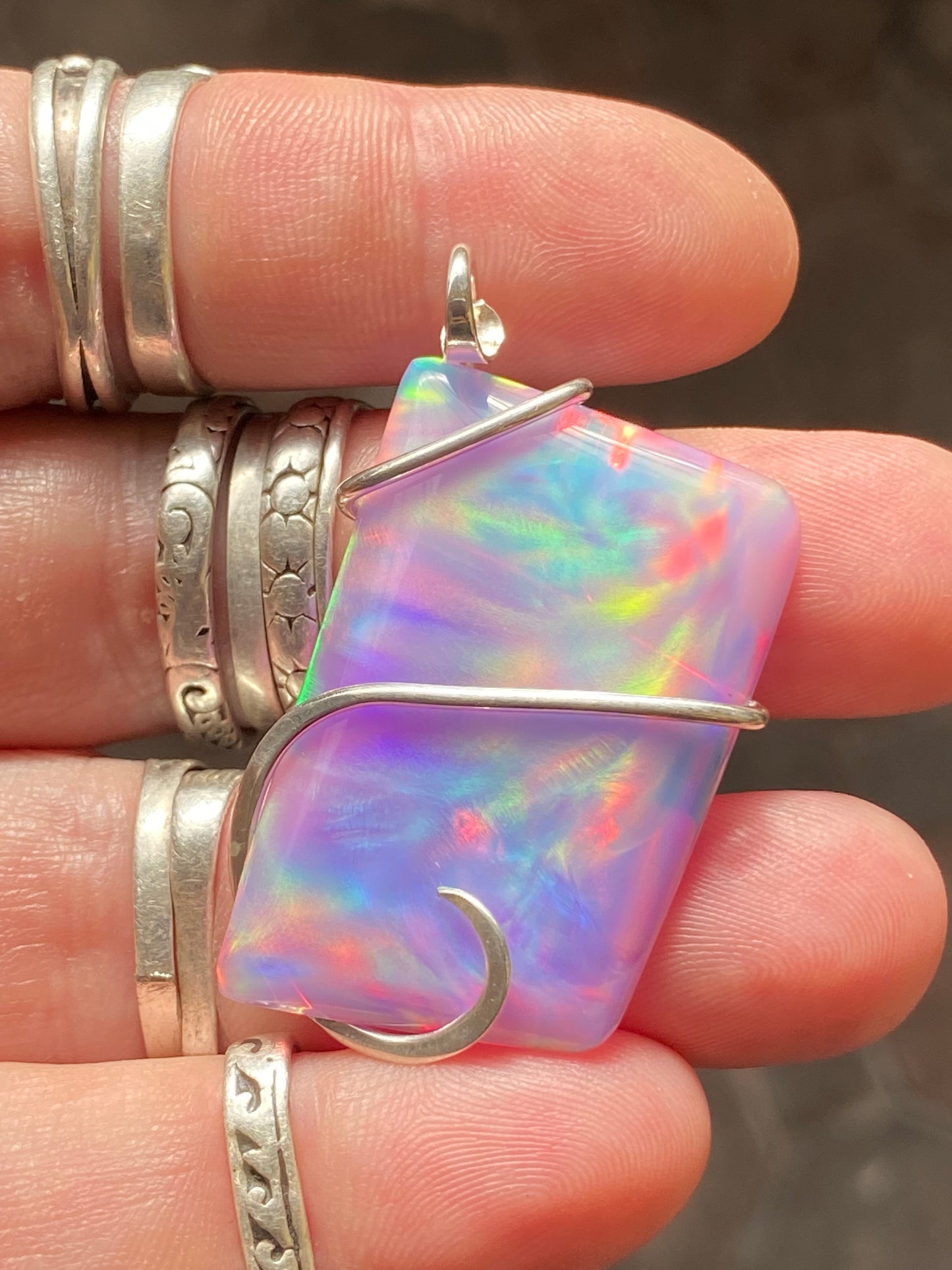 Aurora Borealis Opal in Sterling Silver Tension Wrapped Pendant