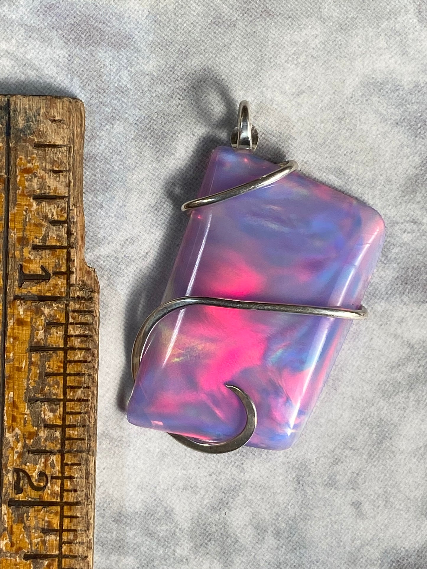 Aurora Borealis Opal in Sterling Silver Tension Wrapped Pendant