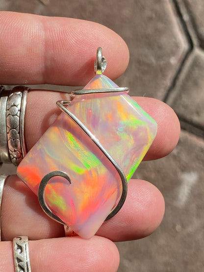 Aurora Borealis Opal in Sterling Silver Tension Wrapped Pendant