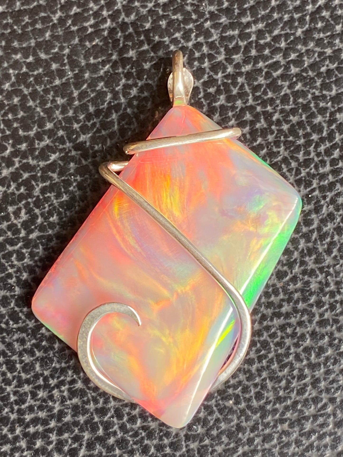 Aurora Borealis Opal in Sterling Silver Tension Wrapped Pendant