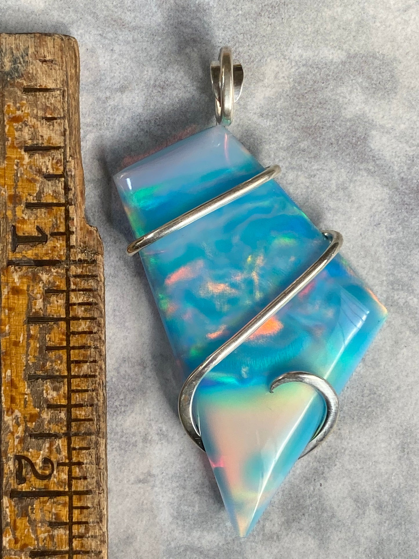 Aurora Borealis Opal in Sterling Silver Tension Wrapped Pendant