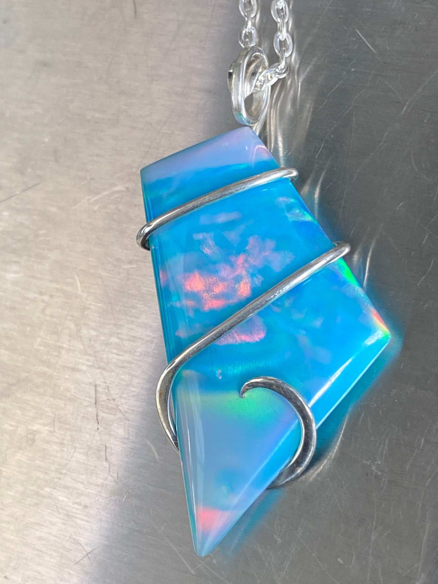 Aurora Borealis Opal in Sterling Silver Tension Wrapped Pendant