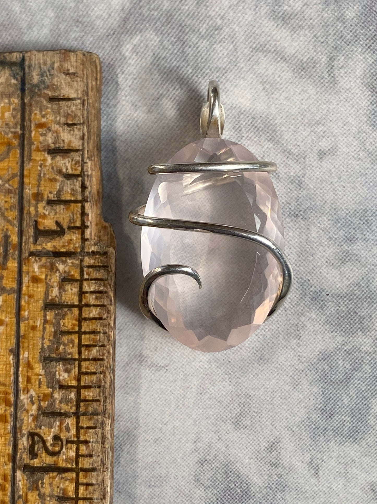 Faceted Rose Quartz in Sterling Silver Tension Wrapped Pendant