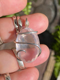Faceted Rose Quartz in Sterling Silver Tension Wrapped Pendant