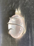 Faceted Rose Quartz in Sterling Silver Tension Wrapped Pendant