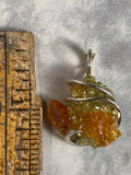 Polish Orange and Green Zincite in Sterling Silver Tension Wrapped Pendant