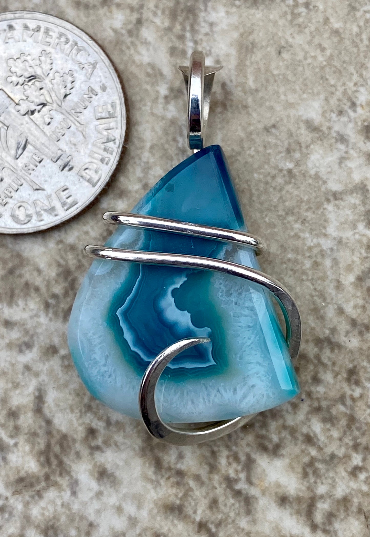 Dyed Agate Slice in Sterling Silver Tension Wrapped Pendant