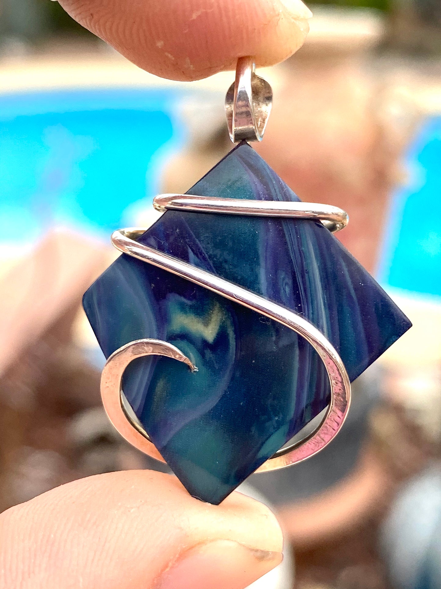 Bowlerite Shard in Sterling Silver Tension Wrapped Pendant