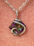 Titanium Infused Faceted Topaz in Sterling Silver Tension Wrapped Pendant