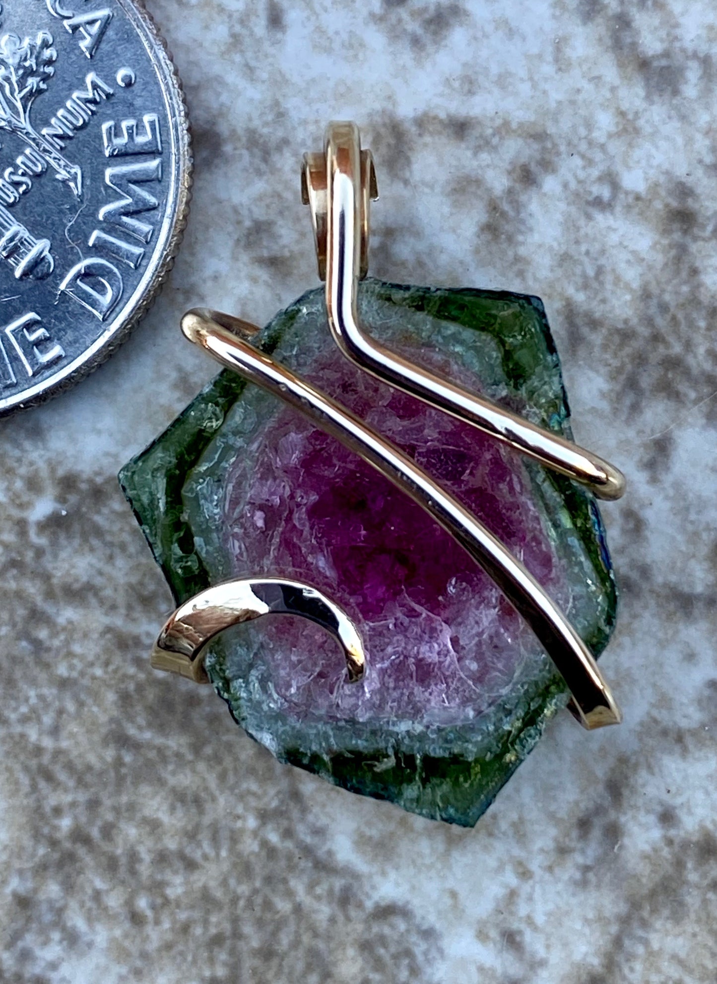 Watermelon Tourmaline Slice in 14kt Gold Tension Wrapped Pendant