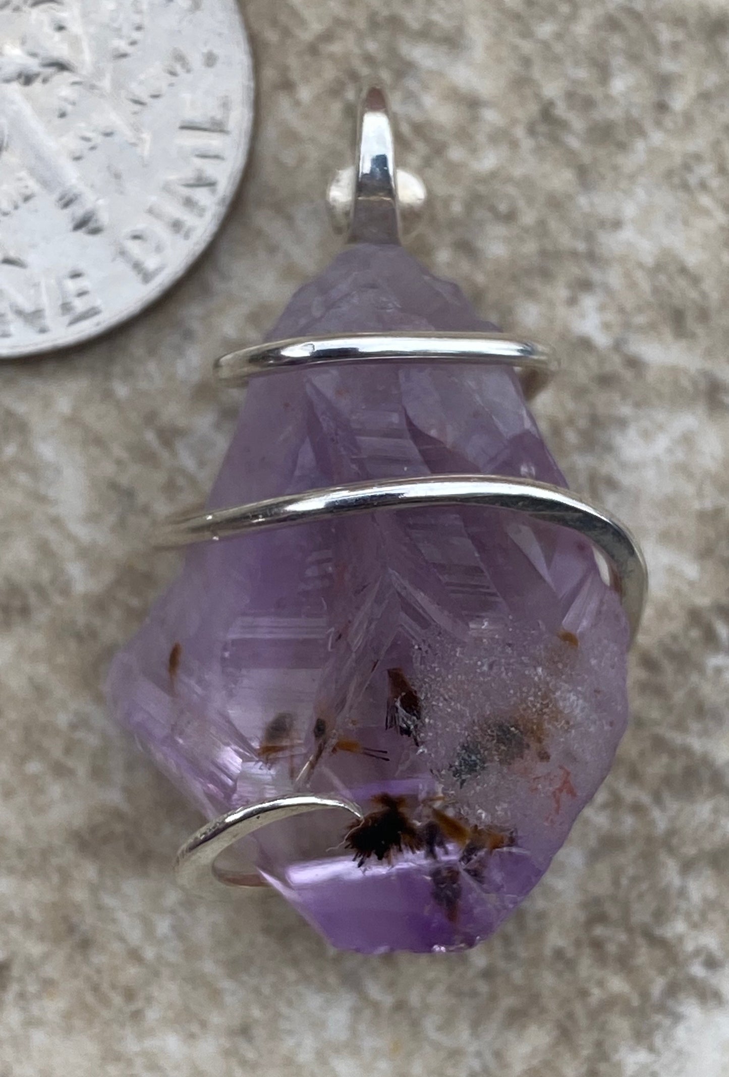 Amethyst Crystal in Sterling Silver Tension Wrapped Pendant