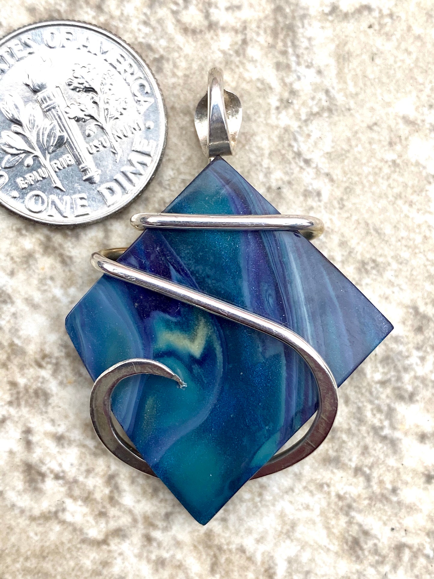 Bowlerite Shard in Sterling Silver Tension Wrapped Pendant